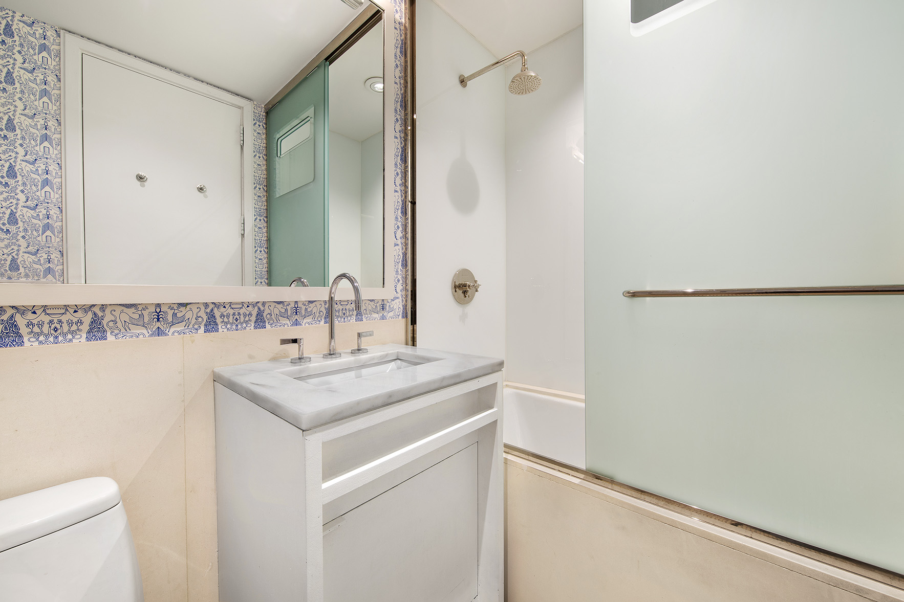92 Laight Street, Unit 5I Manhattan, NY 10013 - Photo 10 of 12 a bathroom with a sink and a mirror