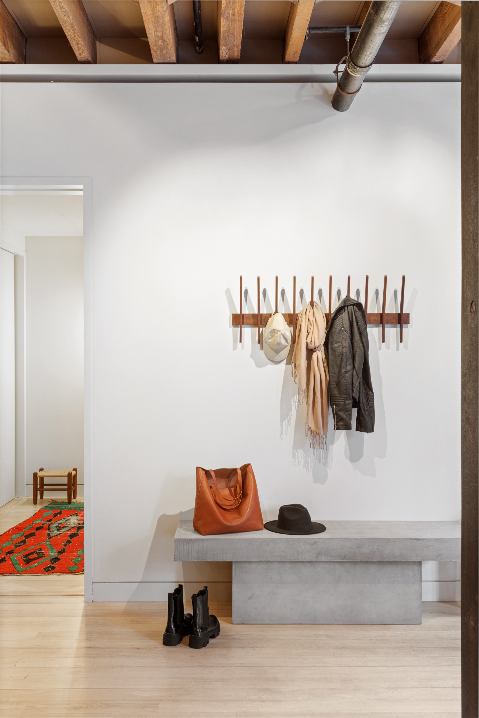 144 Franklin Street, Unit 3 Manhattan, NY 10013 - Photo 9 of 23 a view of walk in closet with clothes and shoes