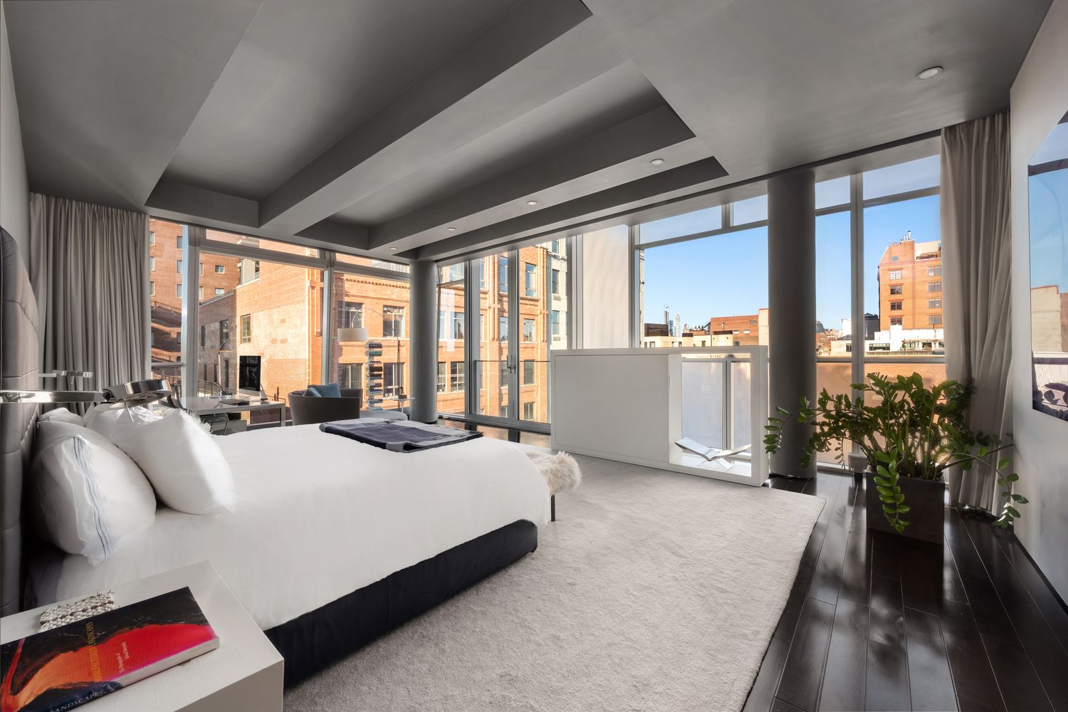 a room with a sink table and chairs