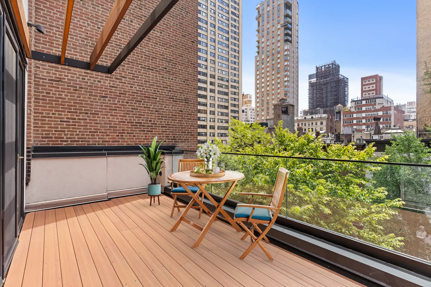 a view of a balcony with chairs