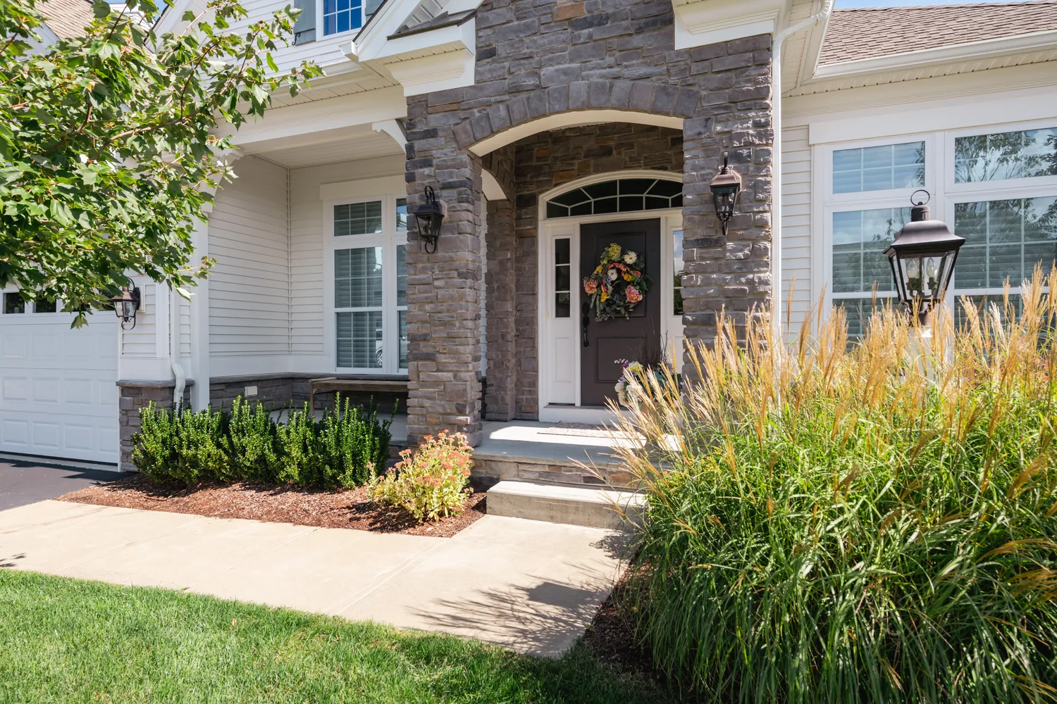 a front view of a house with a yard