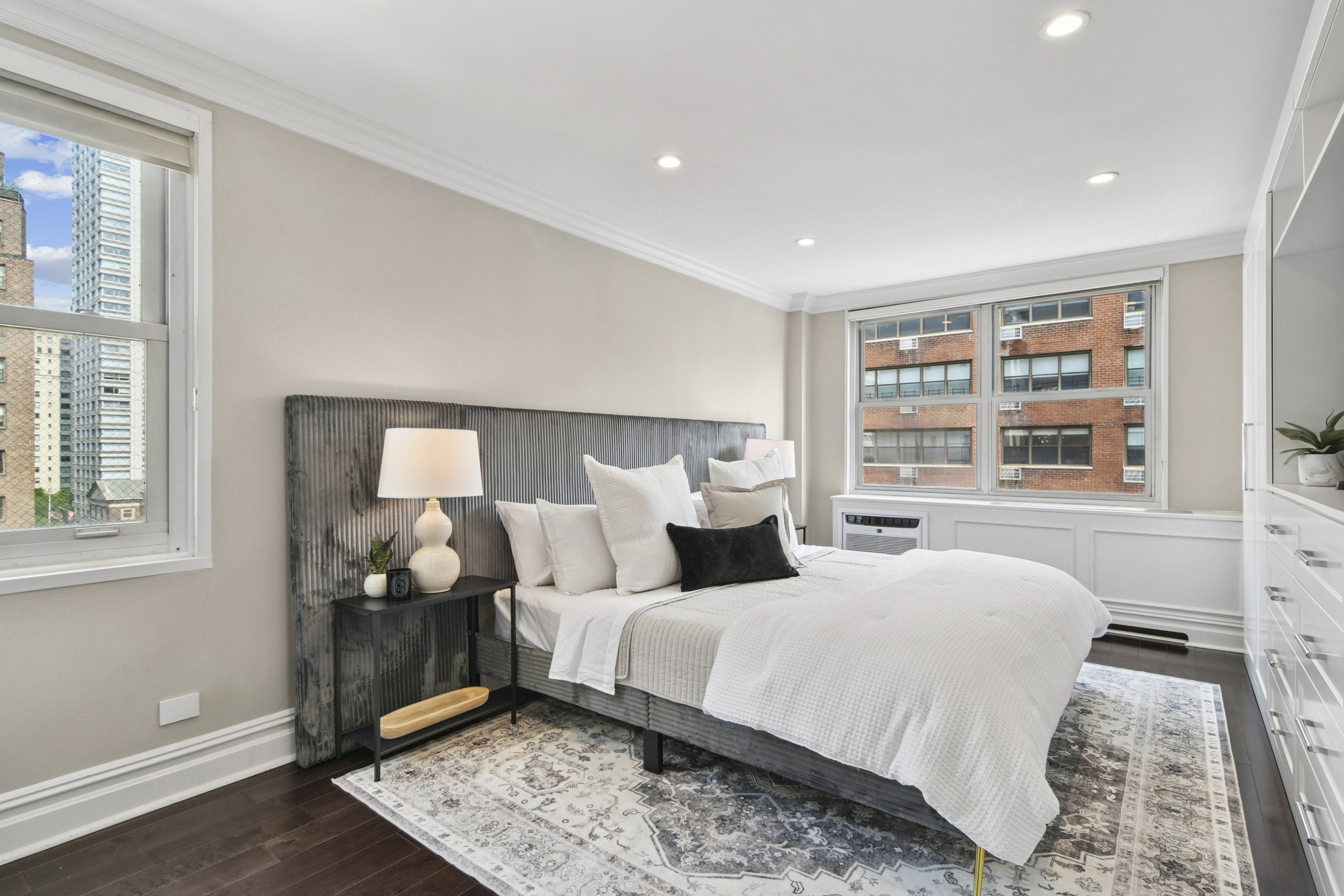 310 East 70th Street, Unit 10E Manhattan, NY 10021 - Photo 3 of 14 a bedroom with double bed and a window