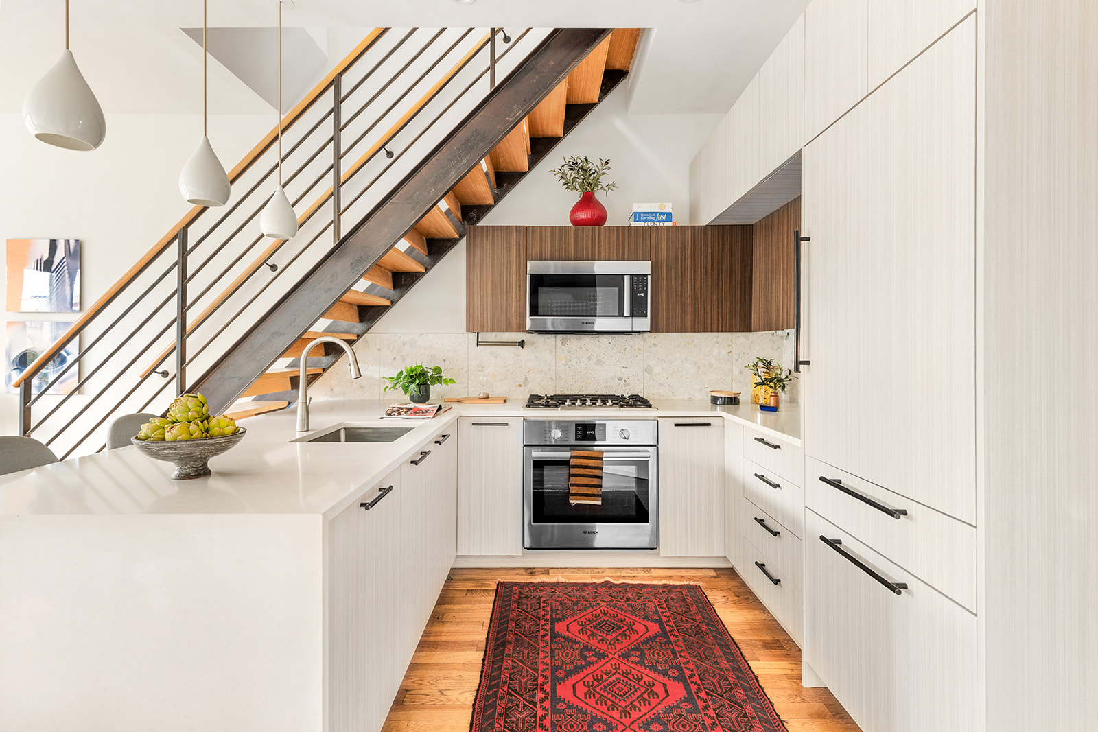 323 Greene Avenue, Unit 4A Brooklyn, NY 11238 - Photo 2 of 14 a kitchen with stainless steel appliances granite countertop a sink and dishwasher a stove top oven with wooden floor