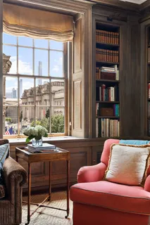 a room with furniture and a window