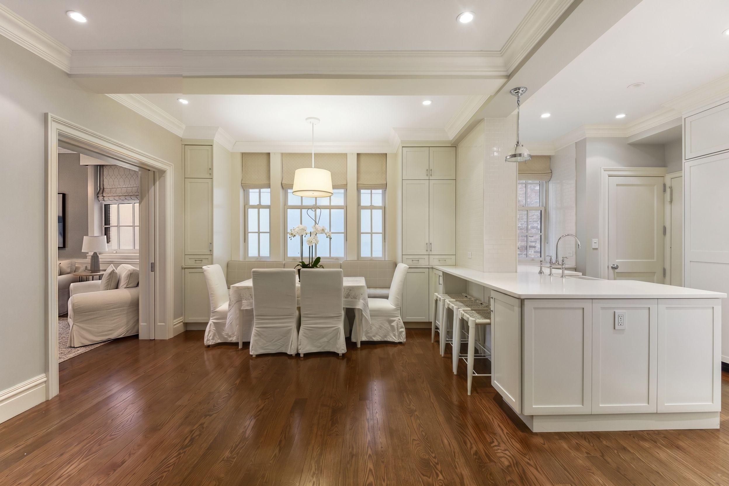 435 East 57th Street, Unit 1CD Manhattan, NY 10022 - Photo 2 of 15 a living room with furniture and wooden floor