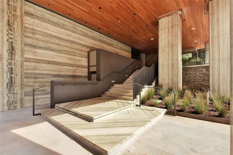 a bathroom with a bathtub and shower