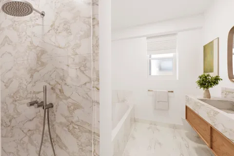 a bathroom with a sink a toilet and a tub