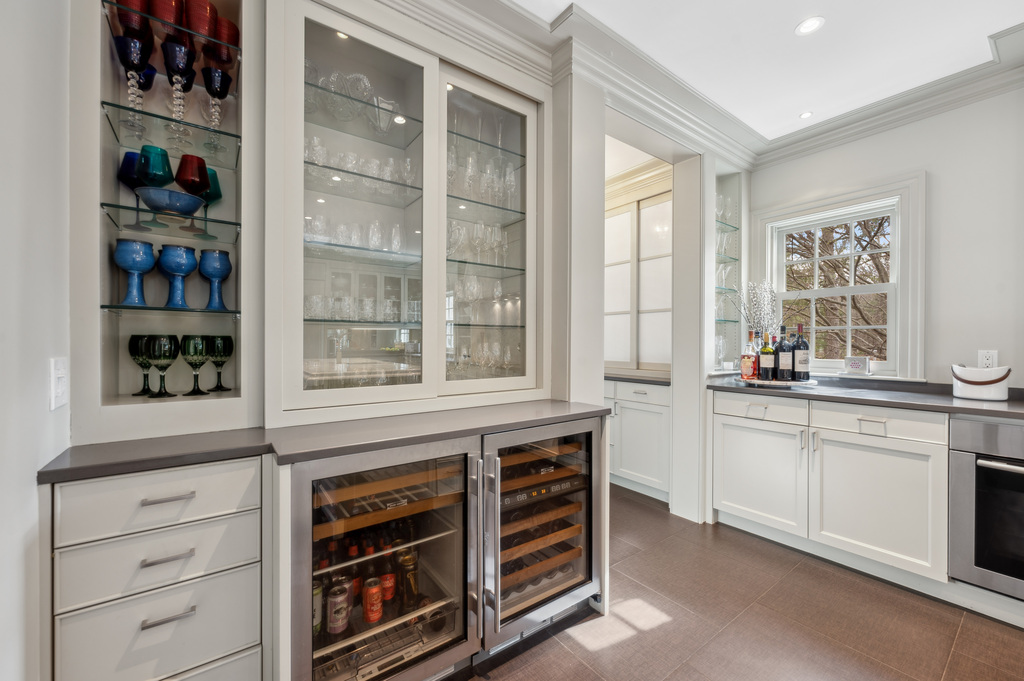 79 Pine Street Dover, MA 02030 - Photo 12 of 25 a kitchen with stainless steel appliances a stove and cabinets