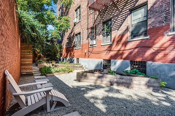 40 Clarkson Avenue, Unit 2L Brooklyn, NY 11226 - Photo 7 of 11 a view of a patio with table and chairs and potted plants
