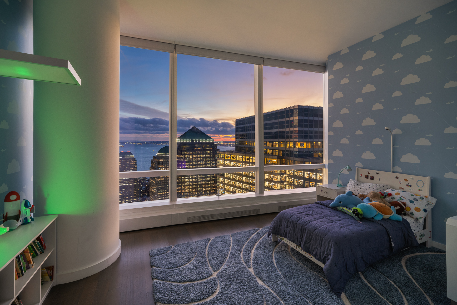 111 Murray Street, Unit 61W Manhattan, NY 10007 - Photo 7 of 35 a living room with furniture and a window
