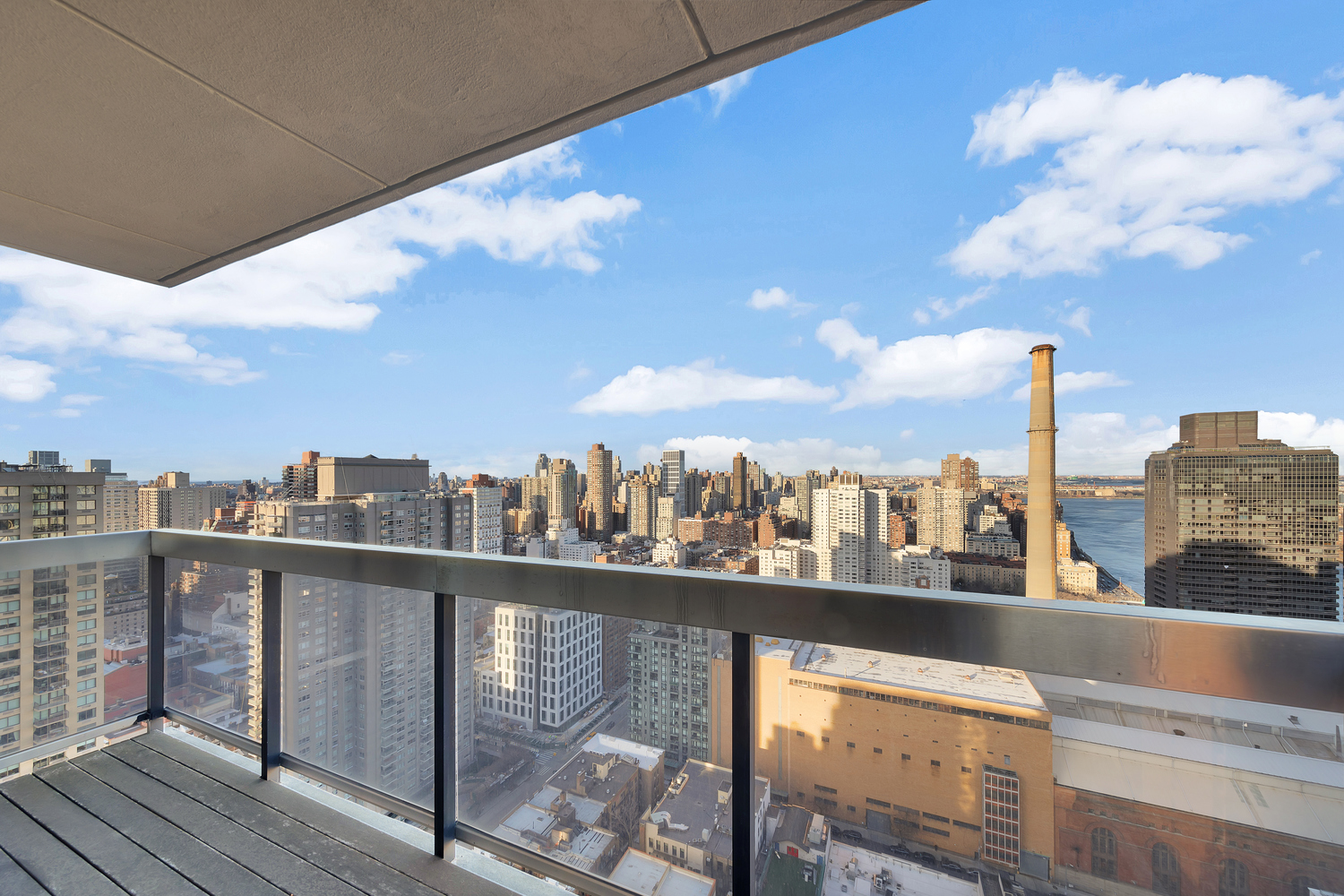515 East 72nd Street, Unit 36B Manhattan, NY 10021 - Photo 9 of 36 a view of a city from a balcony