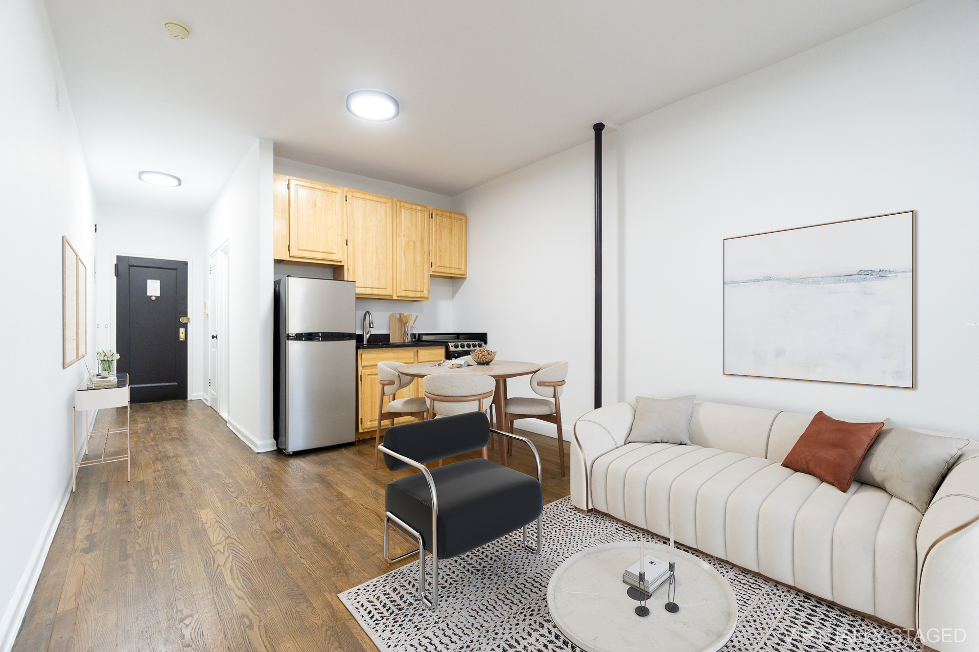 315 East 5th Street, Unit 5D Manhattan, NY 10003 - Photo 4 of 8 a living room with furniture a refrigerator and wooden floor