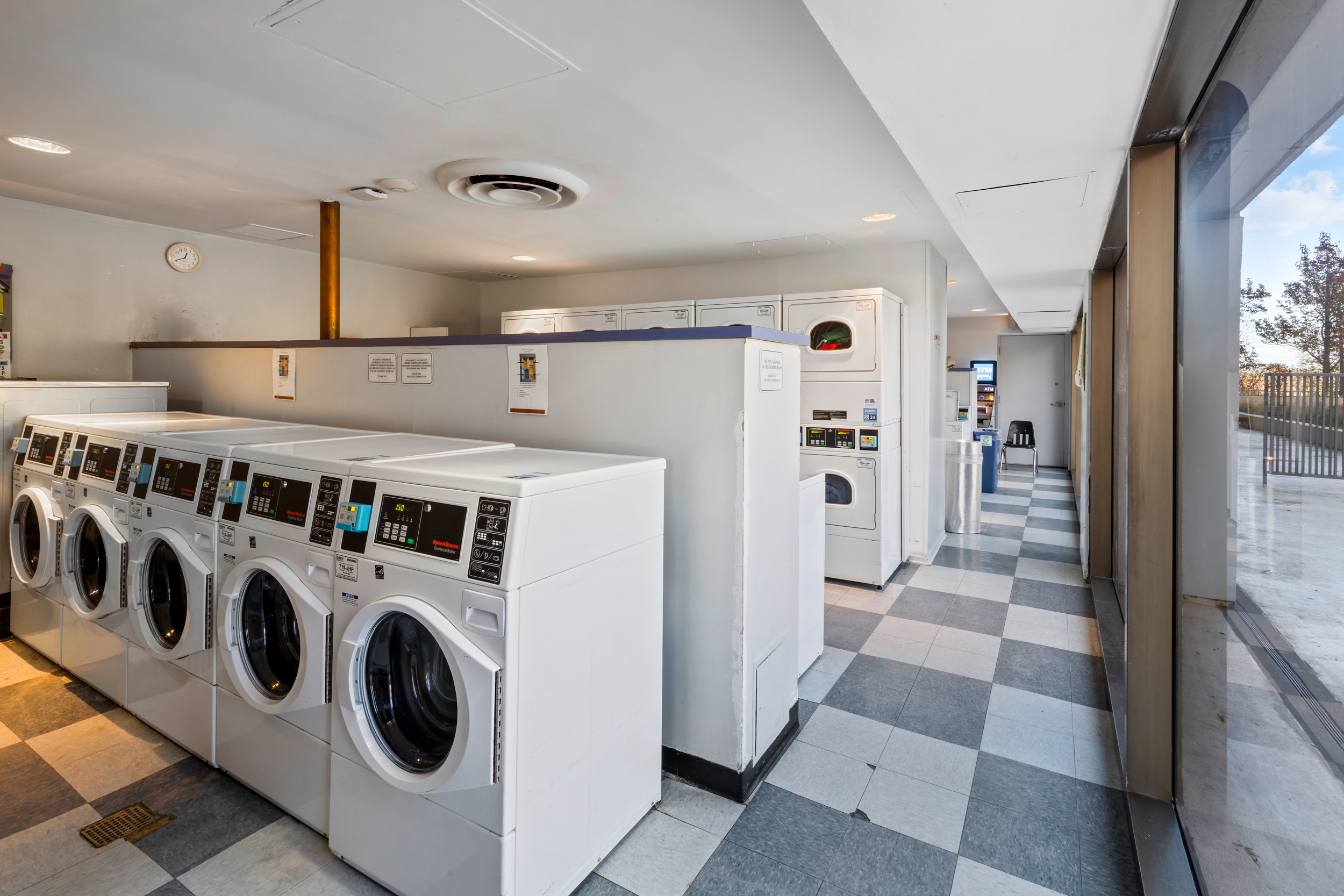 4343 North Clarendon Avenue, Unit 1016 Chicago, IL 60613 - Photo 33 of 35 a utility room with dryer and washer