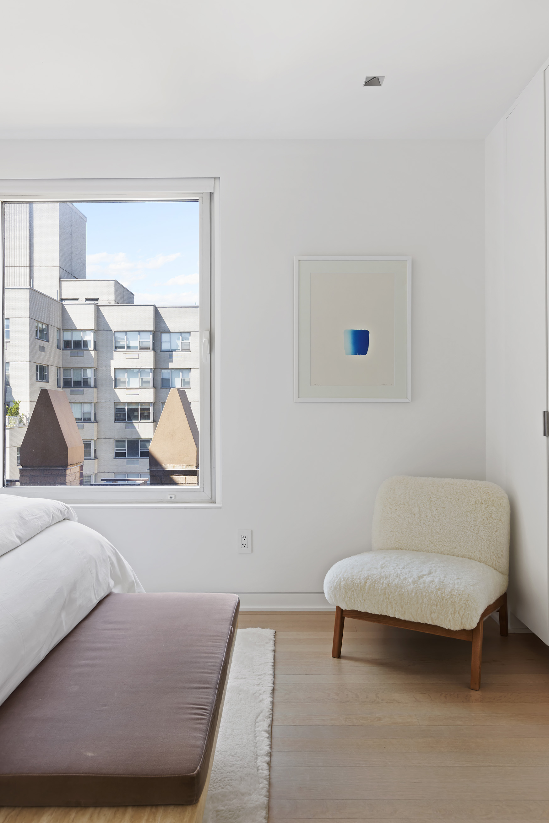 1 5th Avenue, Unit 16F Manhattan, NY 10003 - Photo 16 of 23 a living room with furniture