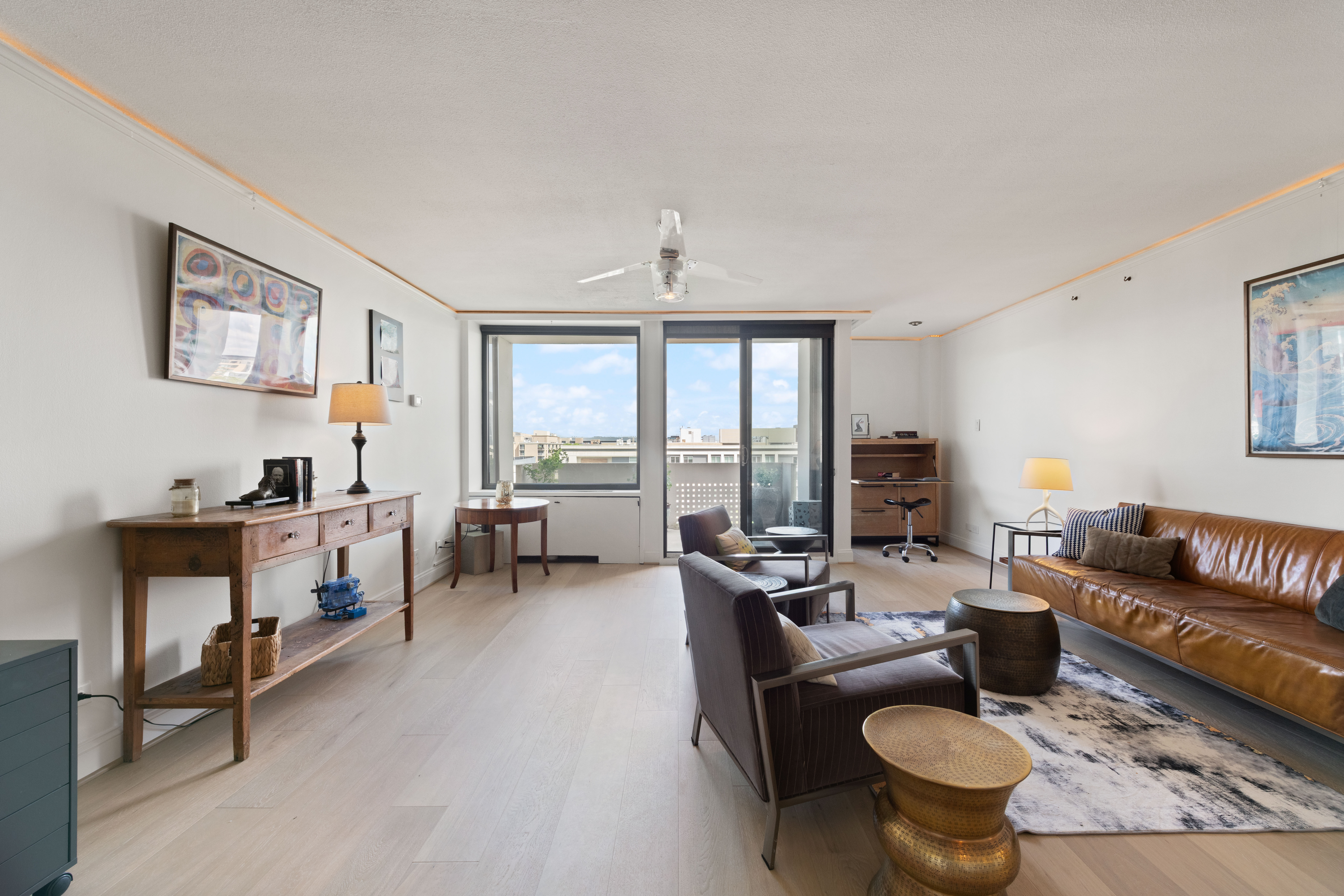 490 M Street Southwest, Unit W802 Washington, DC 20024 - Photo 4 of 24 a living room with furniture and a window
