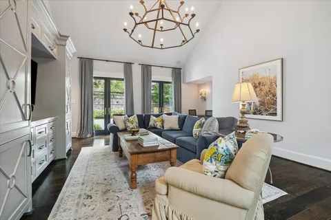 a bathroom with a sink mirror vanity and toilet