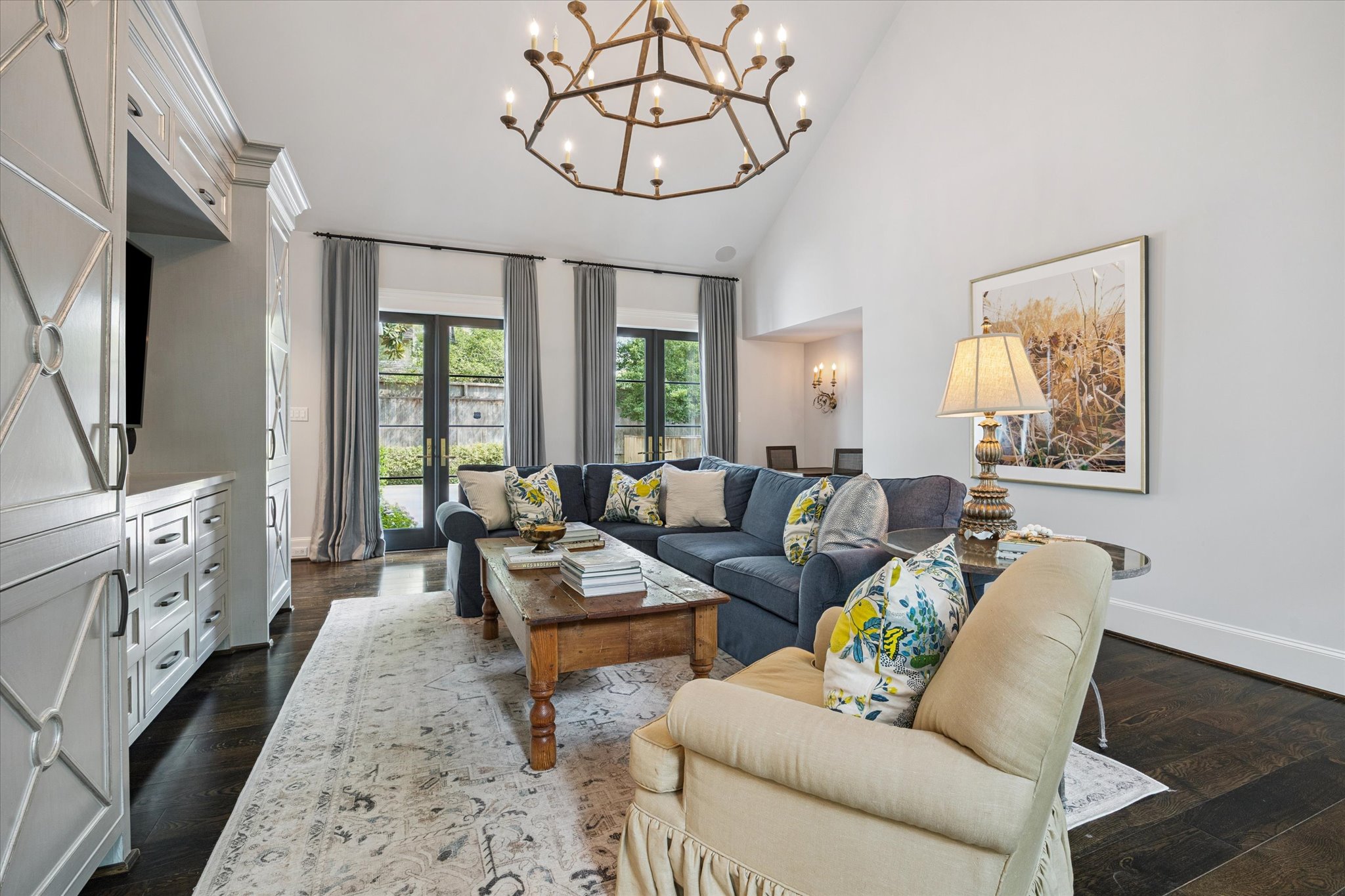 310 Longwoods Lane Houston, TX 77024 - Photo 22 of 49 a living room with furniture a fireplace and a flat screen tv