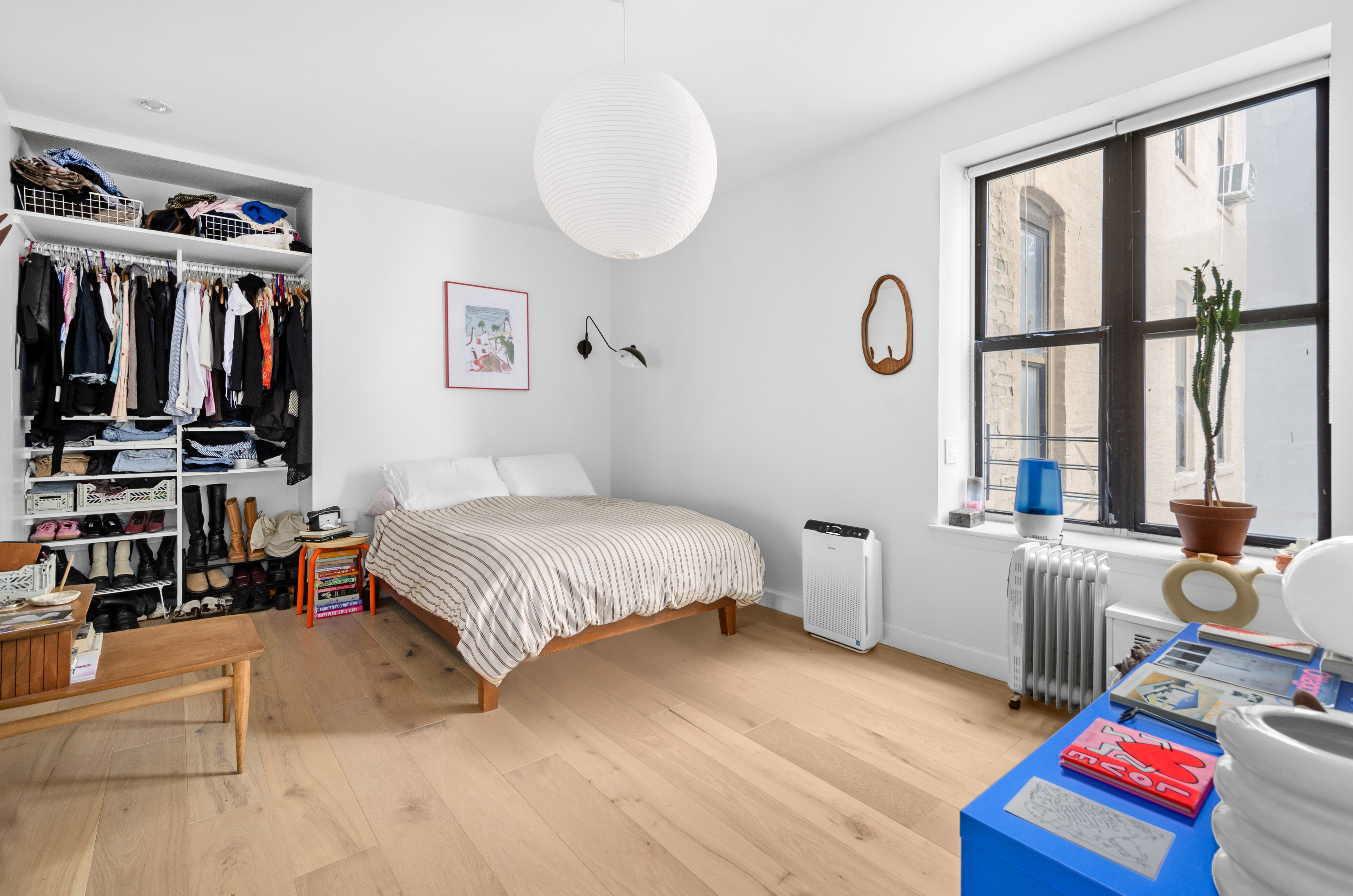 101 Linden Street, Unit 2D Brooklyn, NY 11221 - Photo 4 of 9 a bedroom with a bed and a window