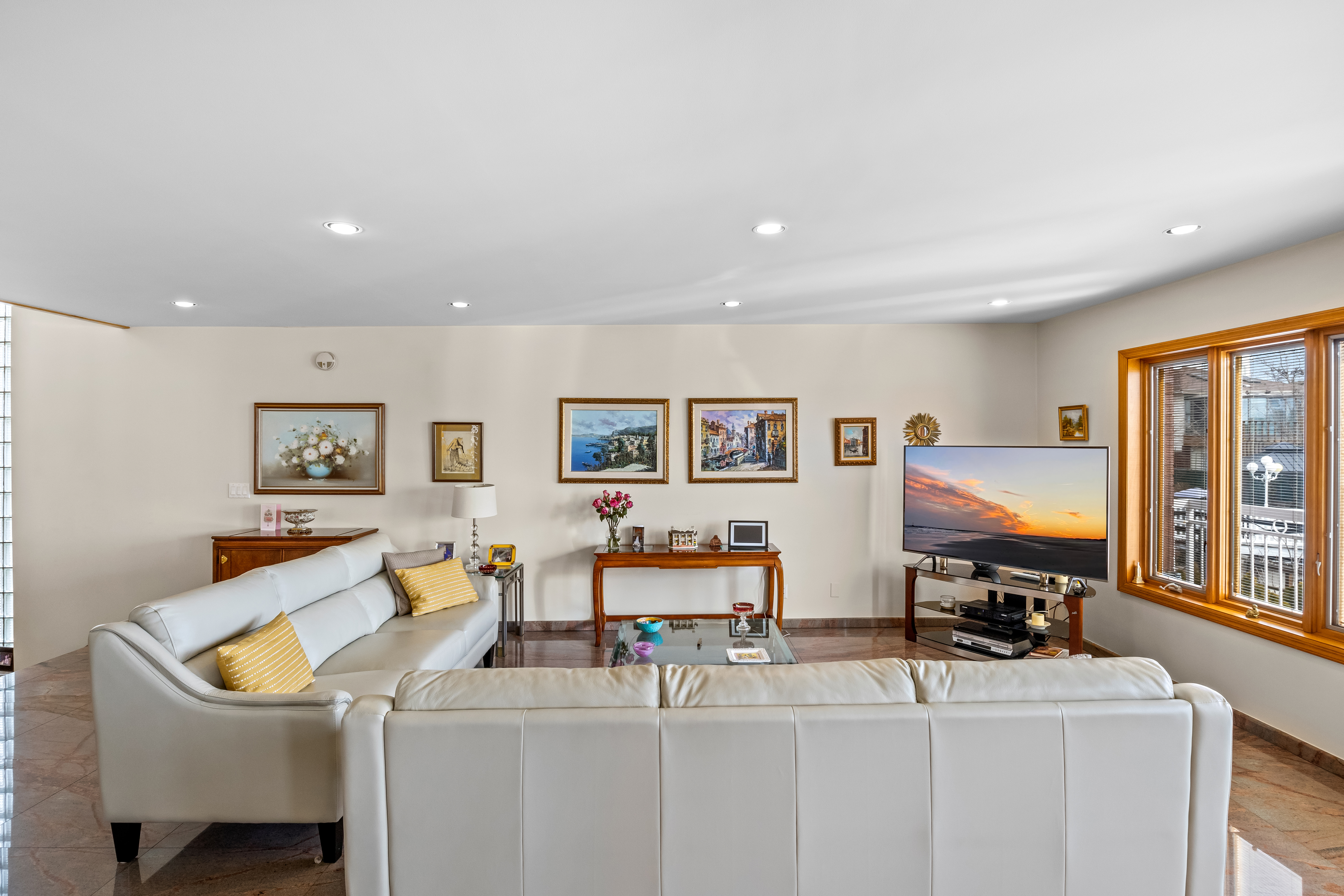 303 Whitman Drive Brooklyn, NY 11234 - Photo 25 of 37 a view of a livingroom with furniture and window