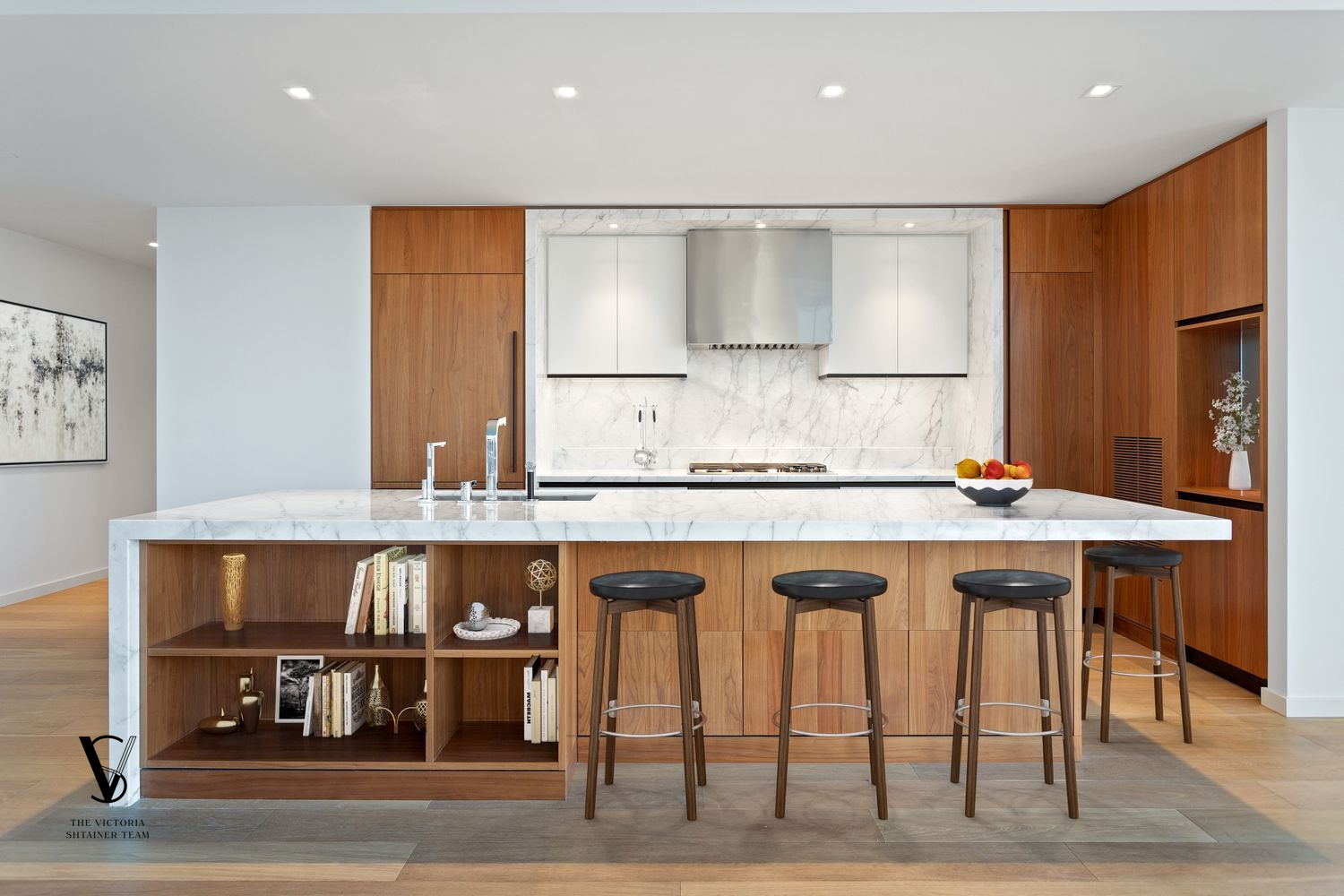 1 West End Avenue, Unit 28C Manhattan, NY 10023 - Photo 2 of 26 a kitchen with stainless steel appliances granite countertop a stove a sink and a refrigerator