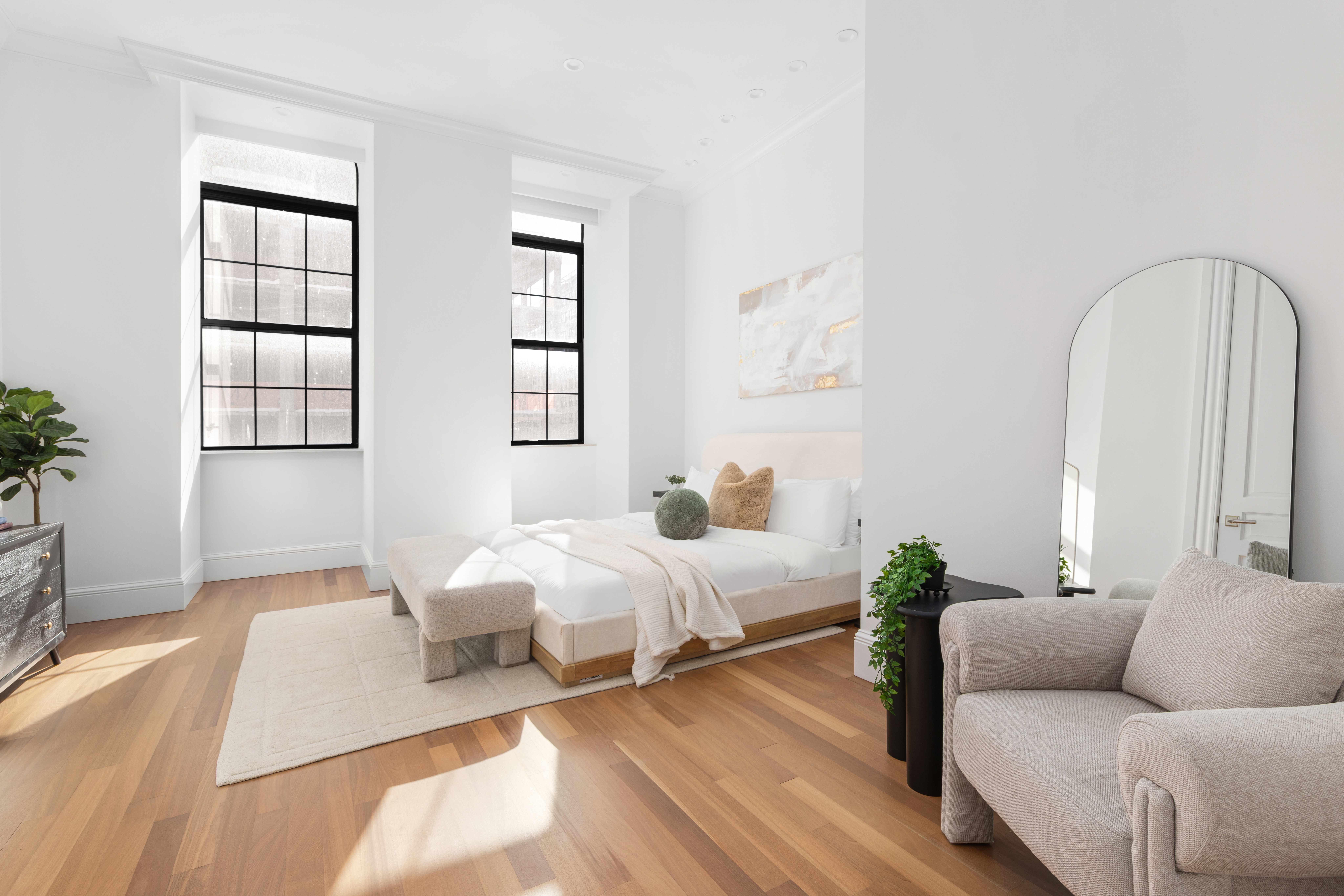 351 East 51st Street, Unit L5C Manhattan, NY 10022 - Photo 4 of 18 a bedroom with furniture and wooden floor