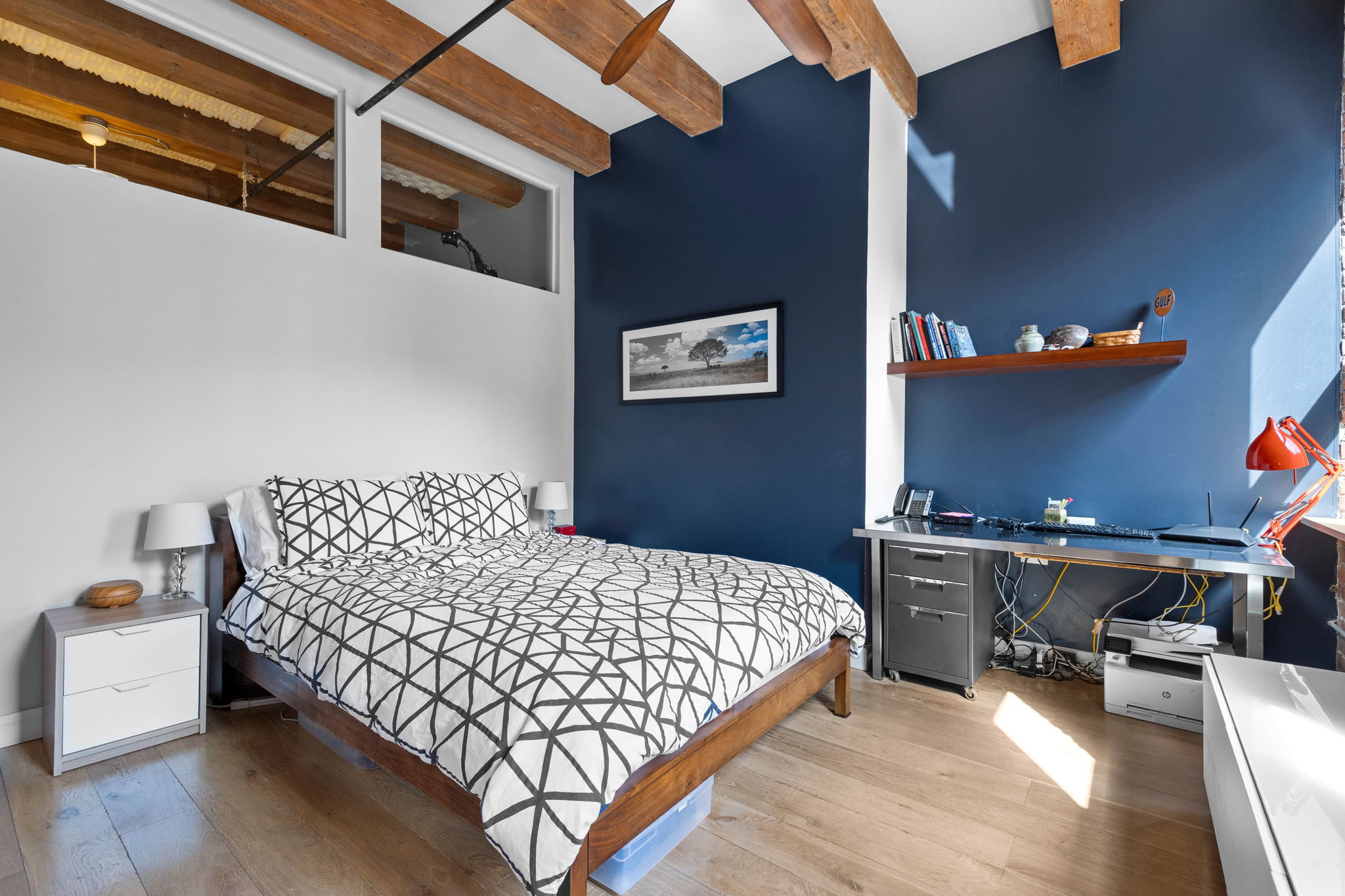 33 Sleeper Street, Unit 307 Boston, MA 02210 - Photo 12 of 15 a bedroom with bed and window