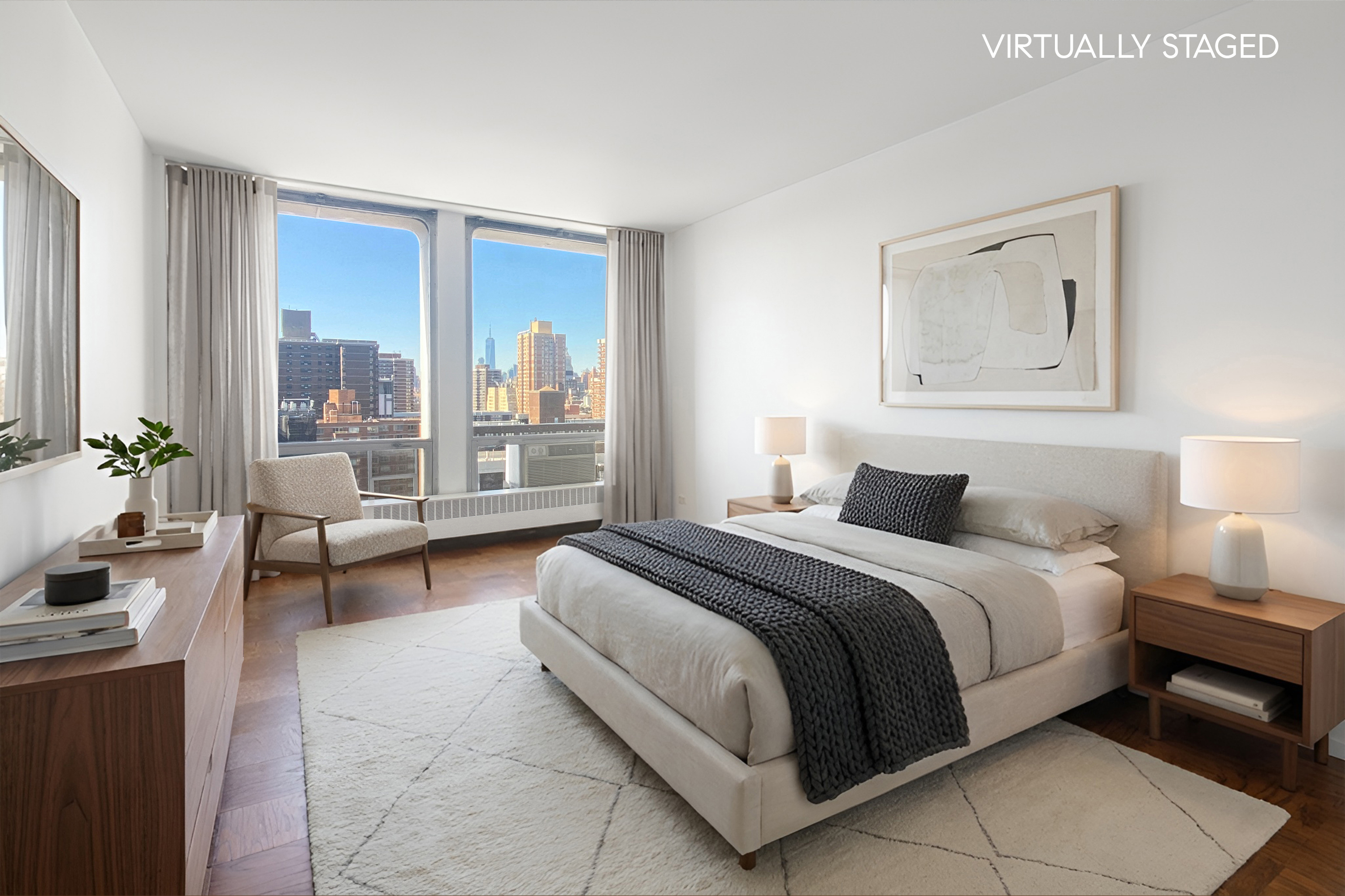 343 East 30th Street, Unit 19K Manhattan, NY 10016 - Photo 12 of 22 a spacious bedroom with a large bed and a couch