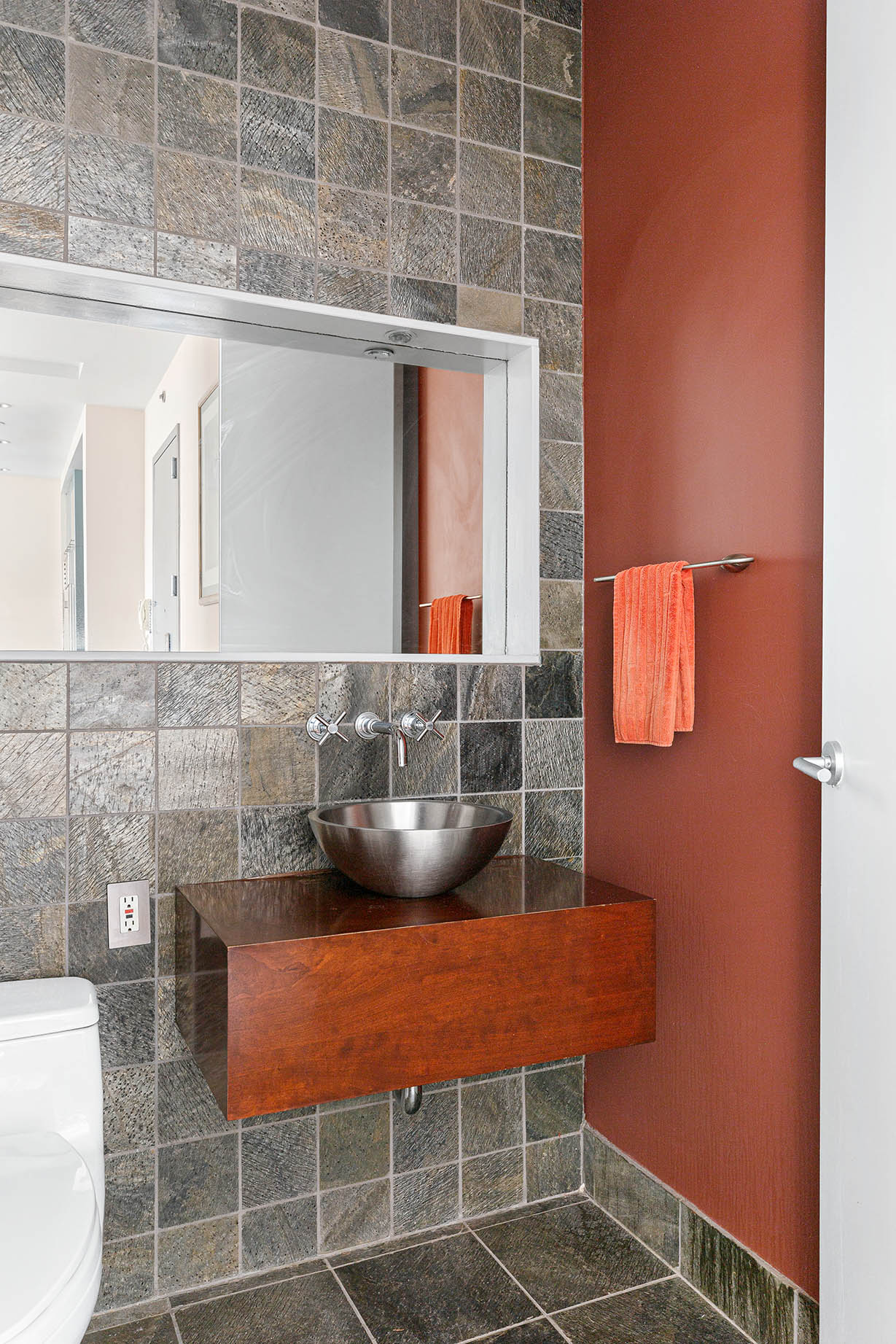 60 Broadway, Unit 2P Brooklyn, NY 11249 - Photo 7 of 8 a room with a sink and a mirror