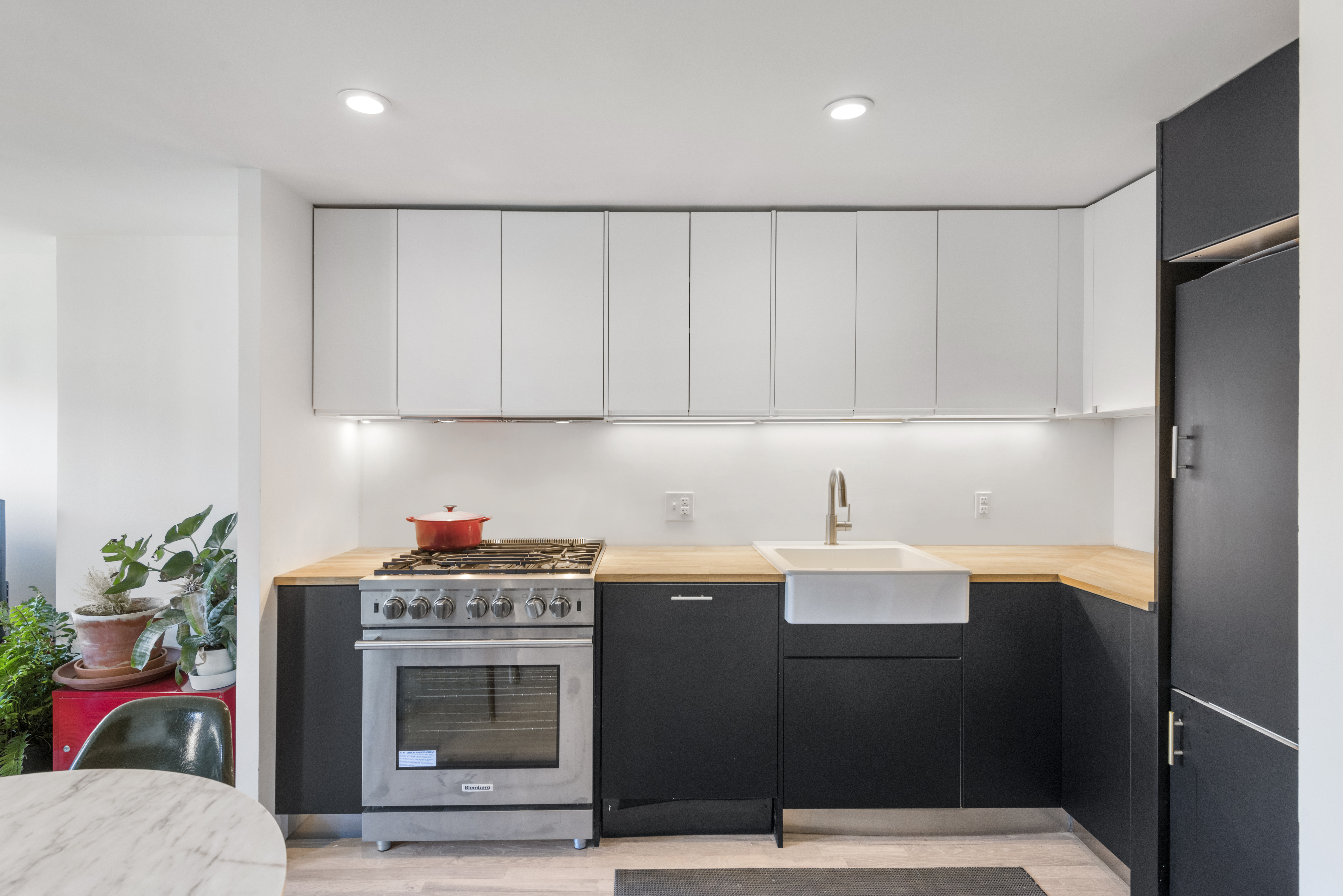11 Willoughby Avenue, Unit PH Brooklyn, NY 11205 - Photo 2 of 4 a kitchen with a sink and cabinets