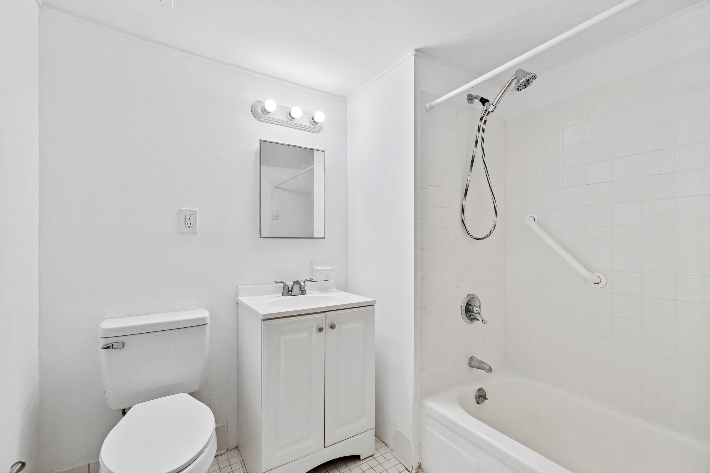 662 Warren Street Brooklyn, NY 11217 - Photo 8 of 9 a bathroom with a sink a toilet and shower