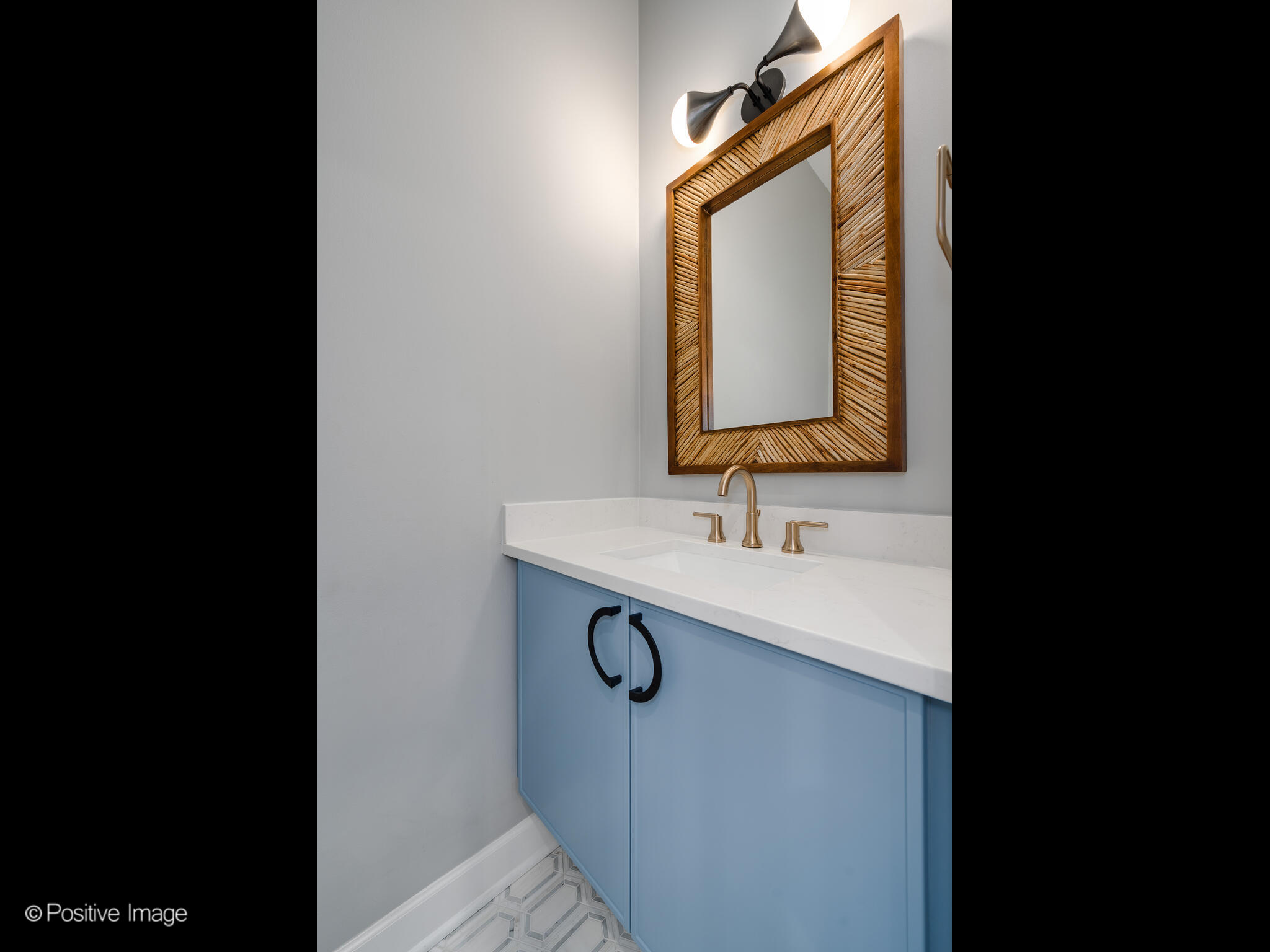 855 North May Street, Unit G Chicago, IL 60642 - Photo 17 of 28 a bathroom with a sink and mirror