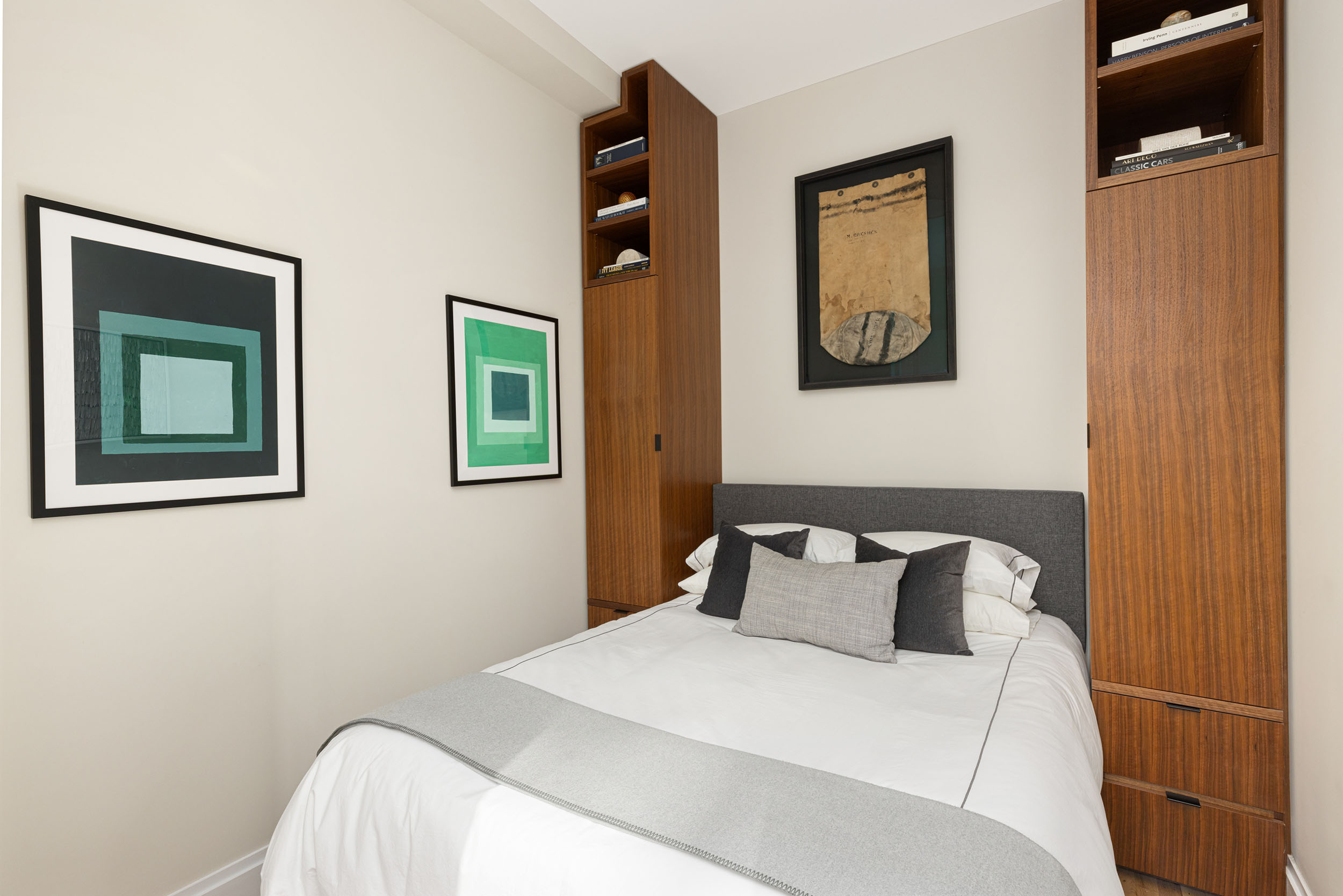 23 East 10th Street, Unit 3B Manhattan, NY 10003 - Photo 4 of 6 a bedroom with a bed and wooden floor