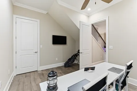 a living room with furniture and windows