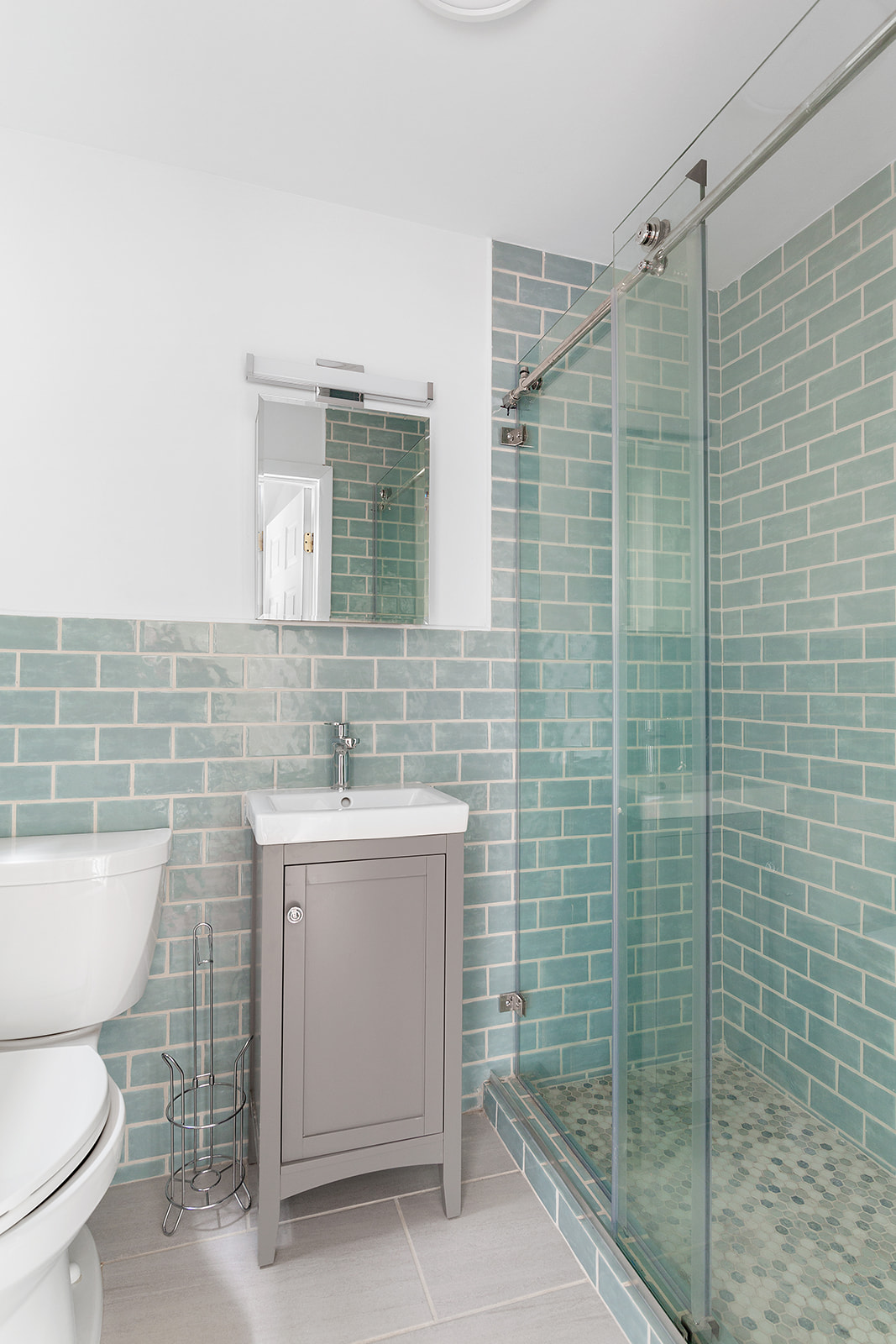 165 Fenimore Street Brooklyn, NY 11225 - Photo 10 of 13 a bathroom with a toilet sink and shower