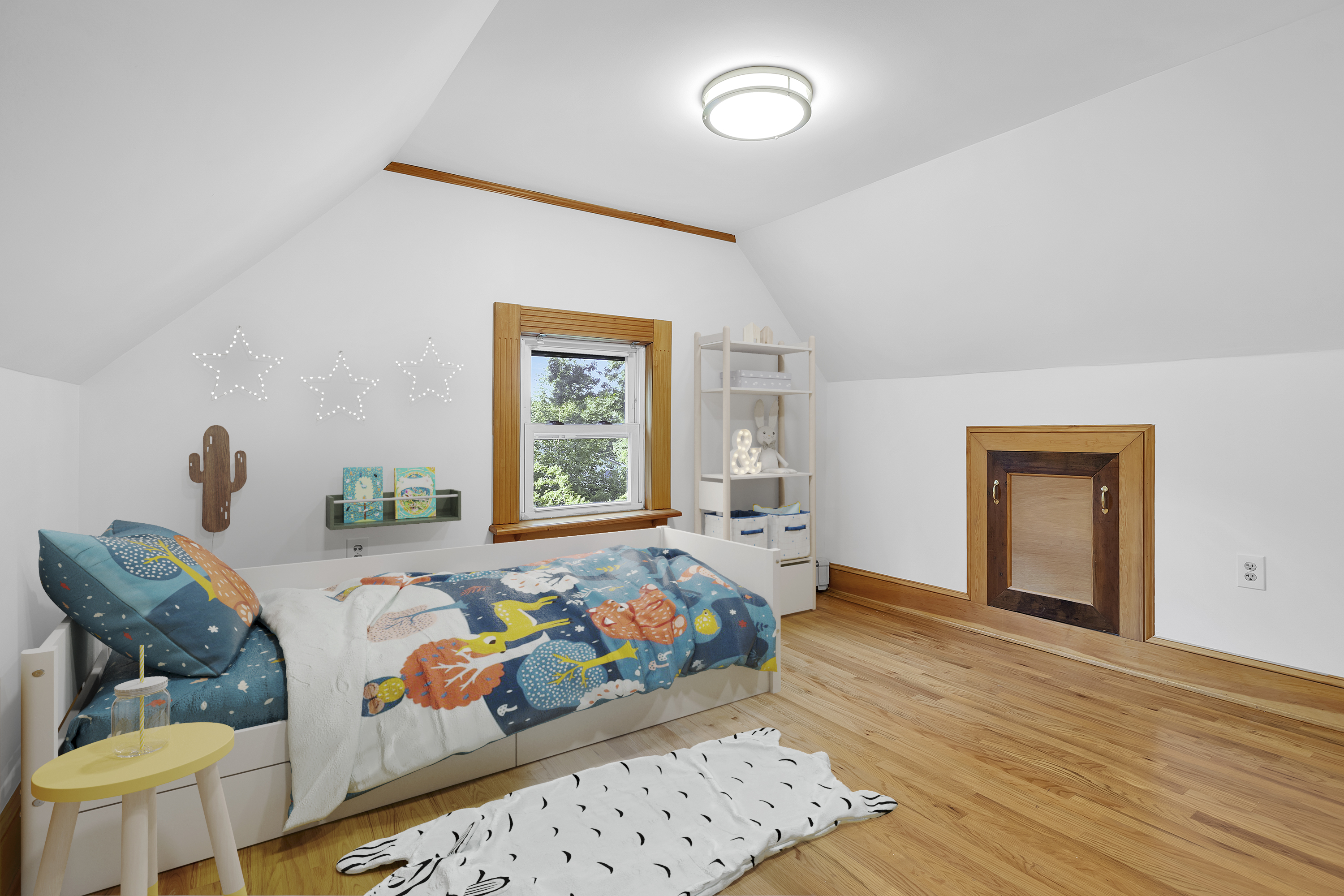 242-09 Pine Street Queens, NY 11363 - Photo 9 of 21 a bedroom with bed and wooden floor