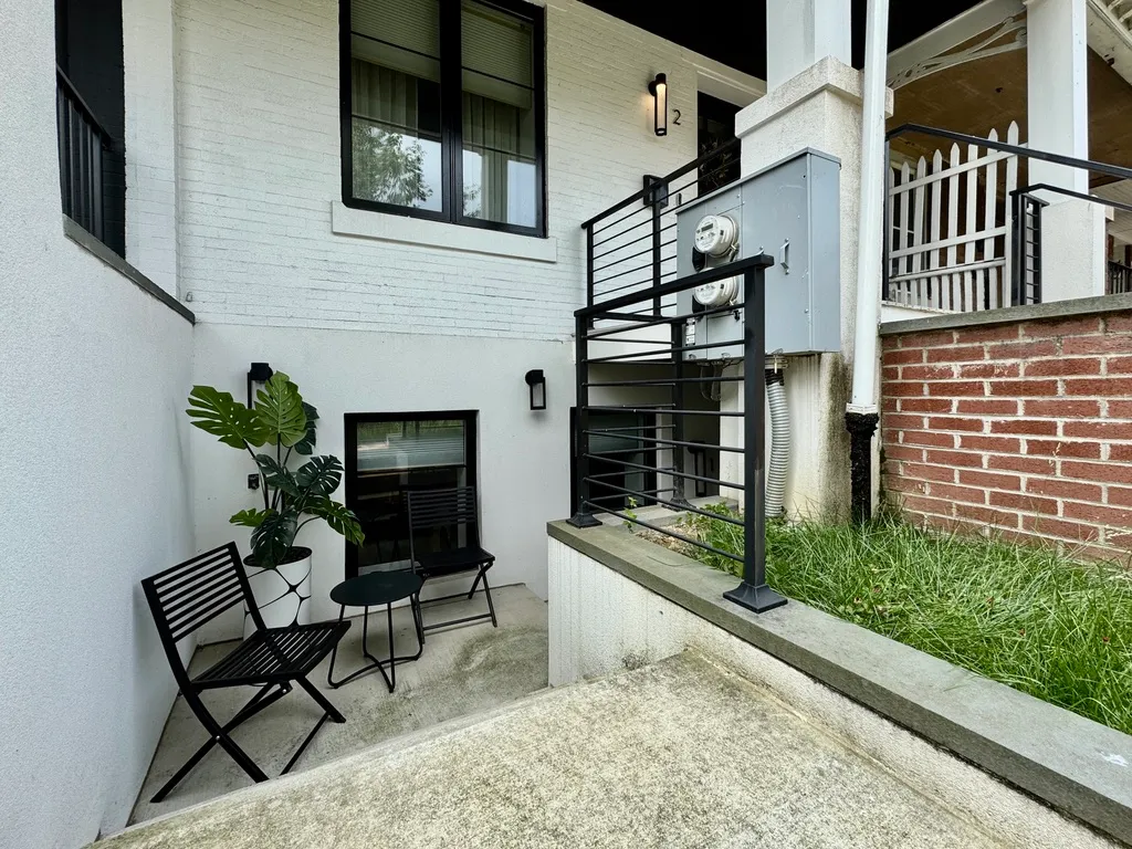 a building outdoor space with patio furniture