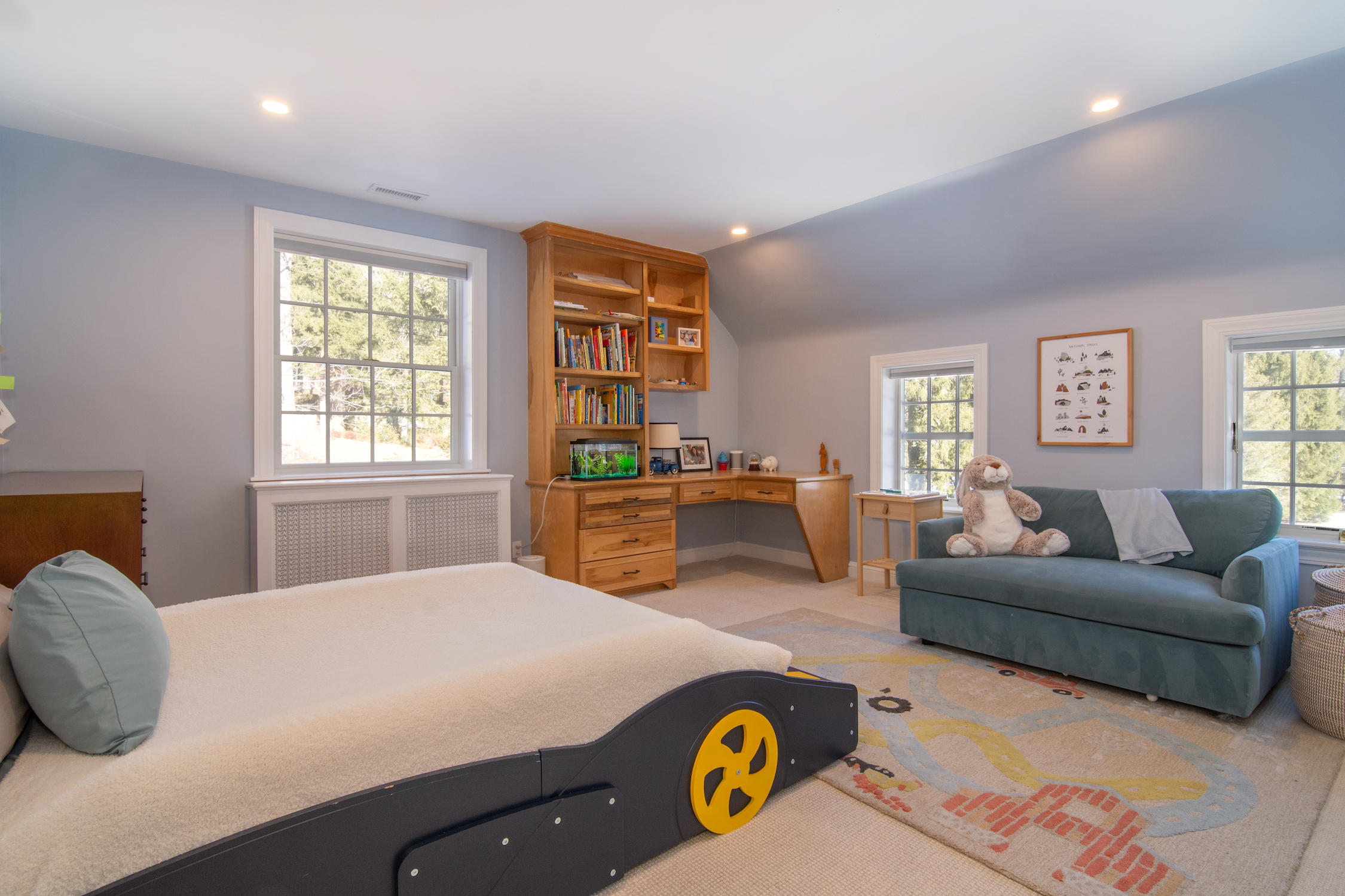 41 Harris Road Katonah, NY 10536 - Photo 21 of 48 a bedroom with a bed and a couch