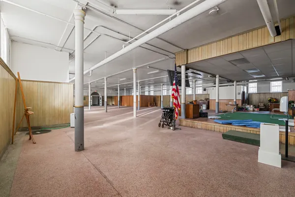 a outdoor space with lots of tables and chairs