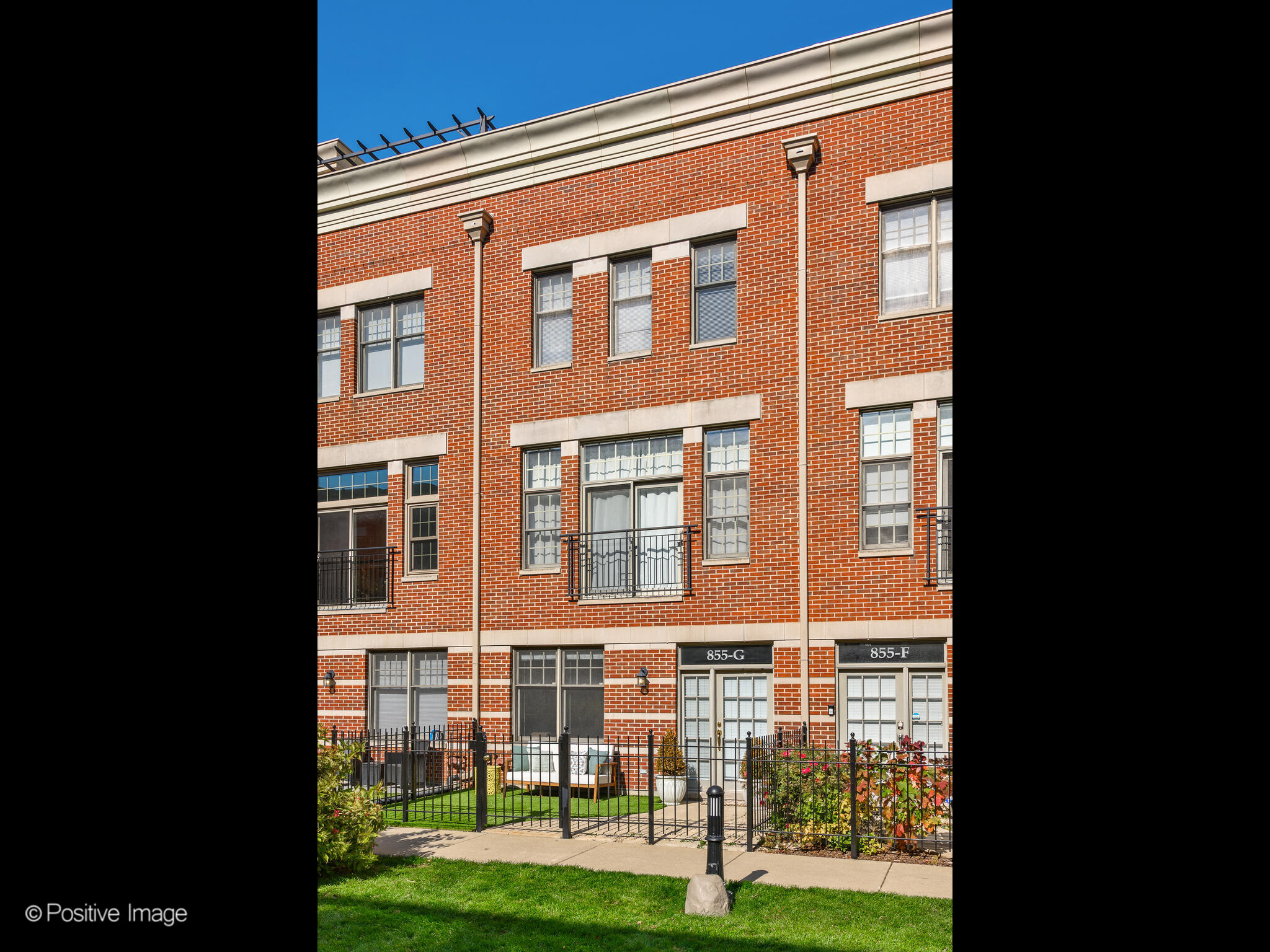 a balcony view with a garden