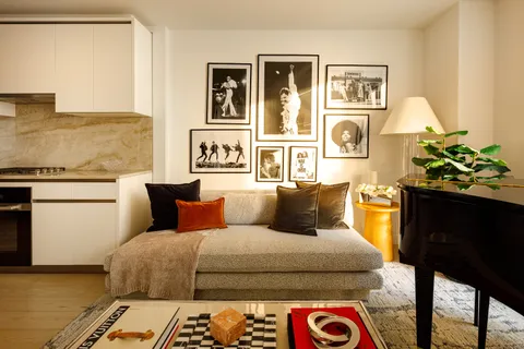 a bed room with a bed and a couch