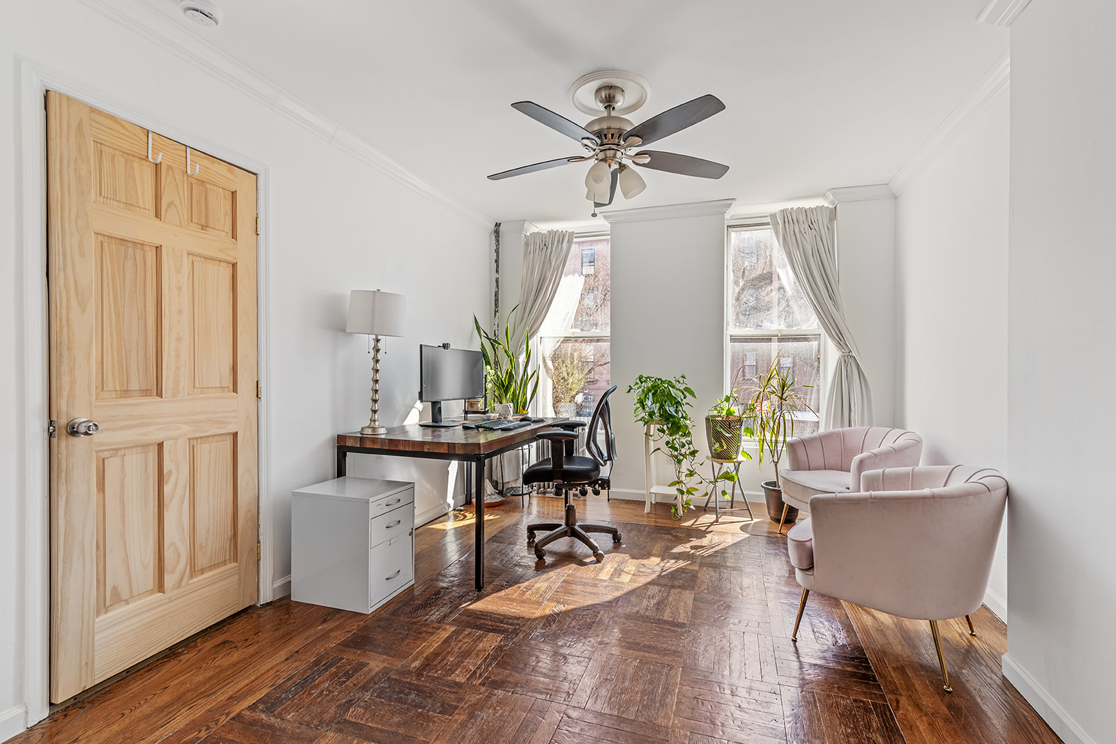 231 Vernon Avenue Brooklyn, NY 11206 - Photo 4 of 13 a living room with furniture a window and wooden floor