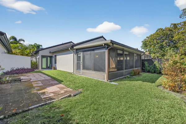 a view of front of house with a yard