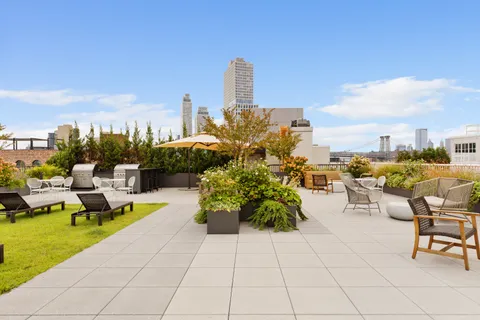 a view of a terrace with chairs