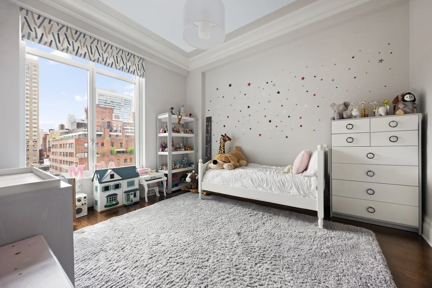 a bathroom with a sink toilet a mirror and shower