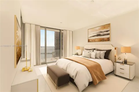 a spacious bedroom with a bed and a large window