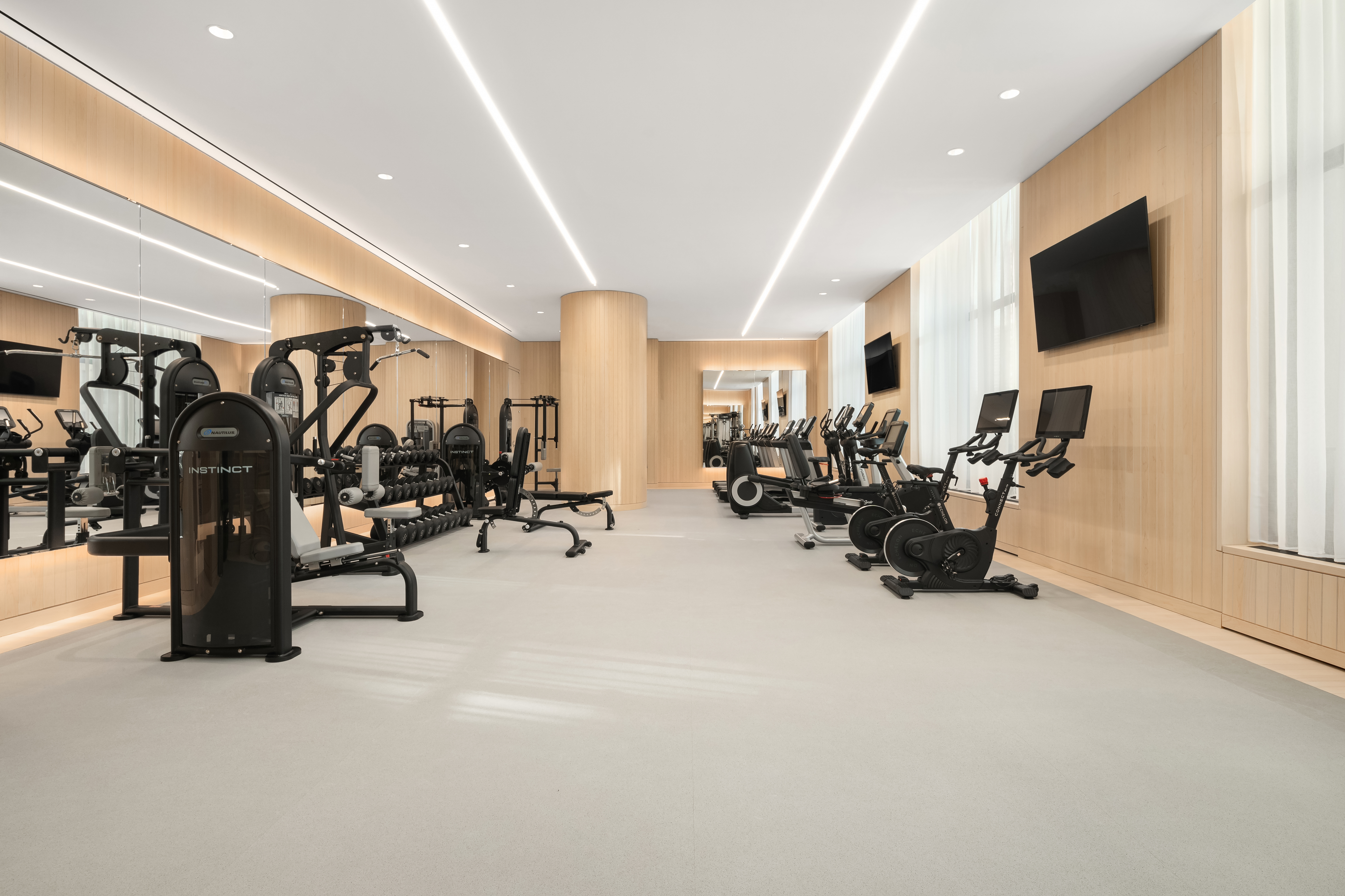 430 East 58th Street, Unit PH71 Manhattan, NY 10022 - Photo 22 of 26 a view of a room with gym equipment