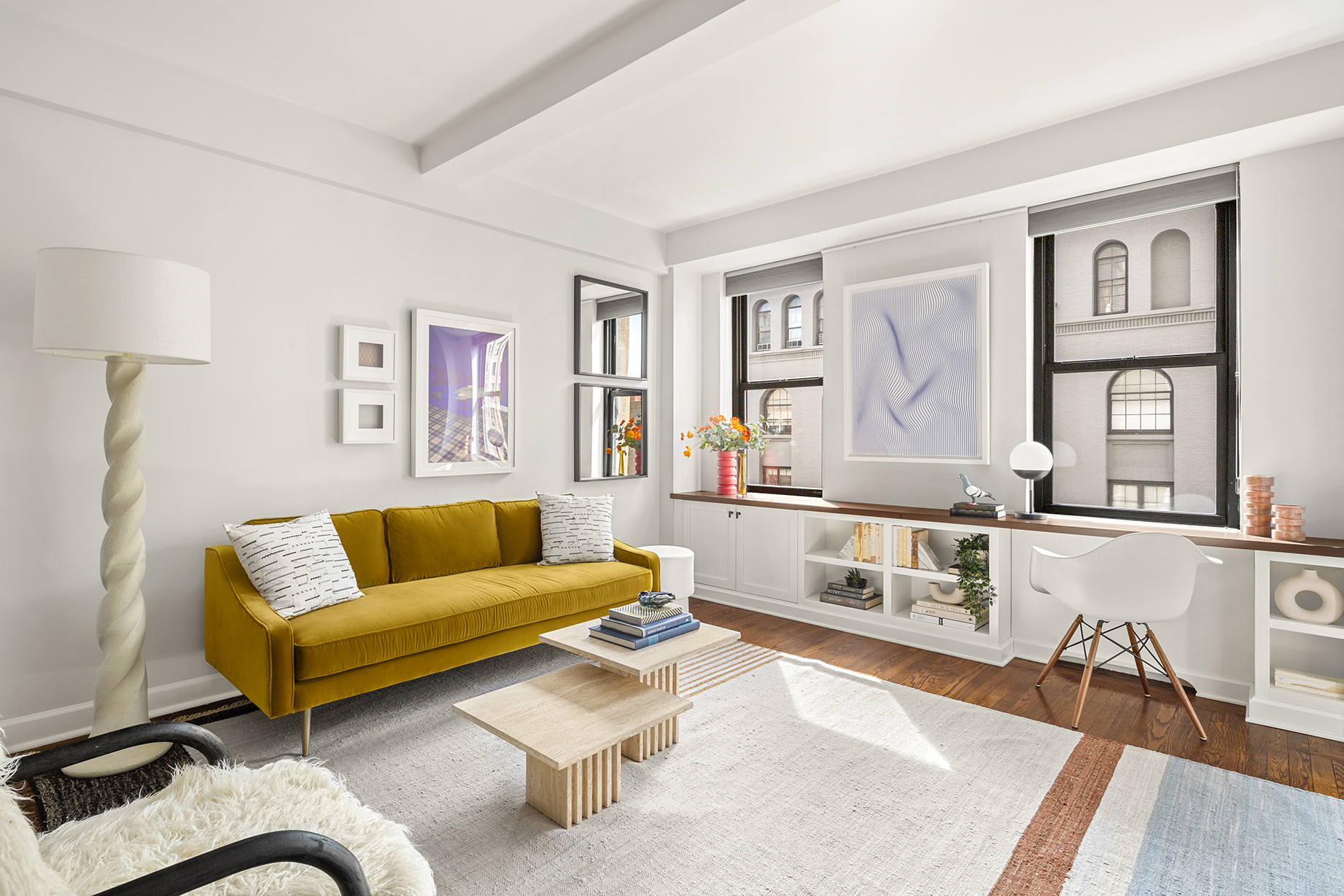 161 West 16th Street, Unit 6E Manhattan, NY 10011 - Photo 5 of 15 a living room with furniture and a table