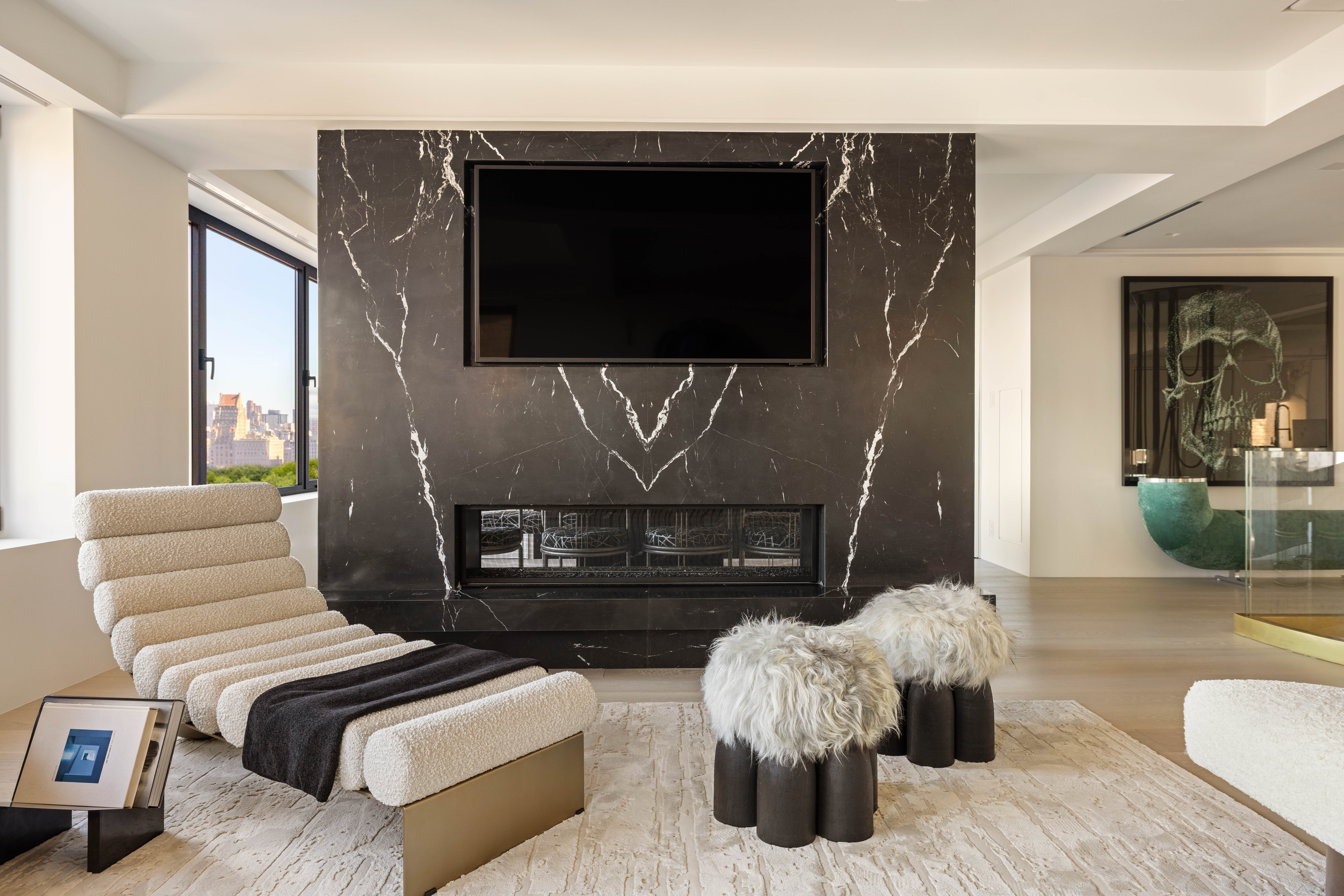 230 Central Park South Manhattan, NY 10019 - Photo 2 of 23 a living room with furniture and a flat screen tv