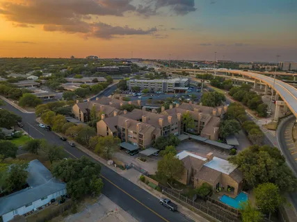 an aerial view of residential building with outdoor space