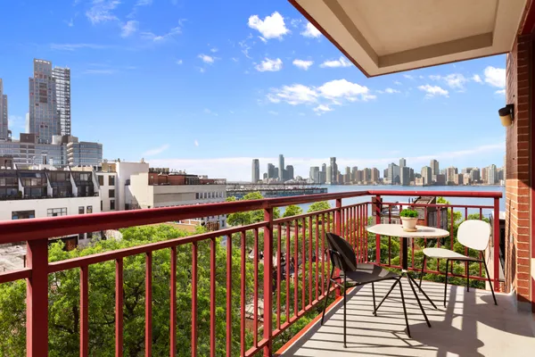 a view of a balcony with city view